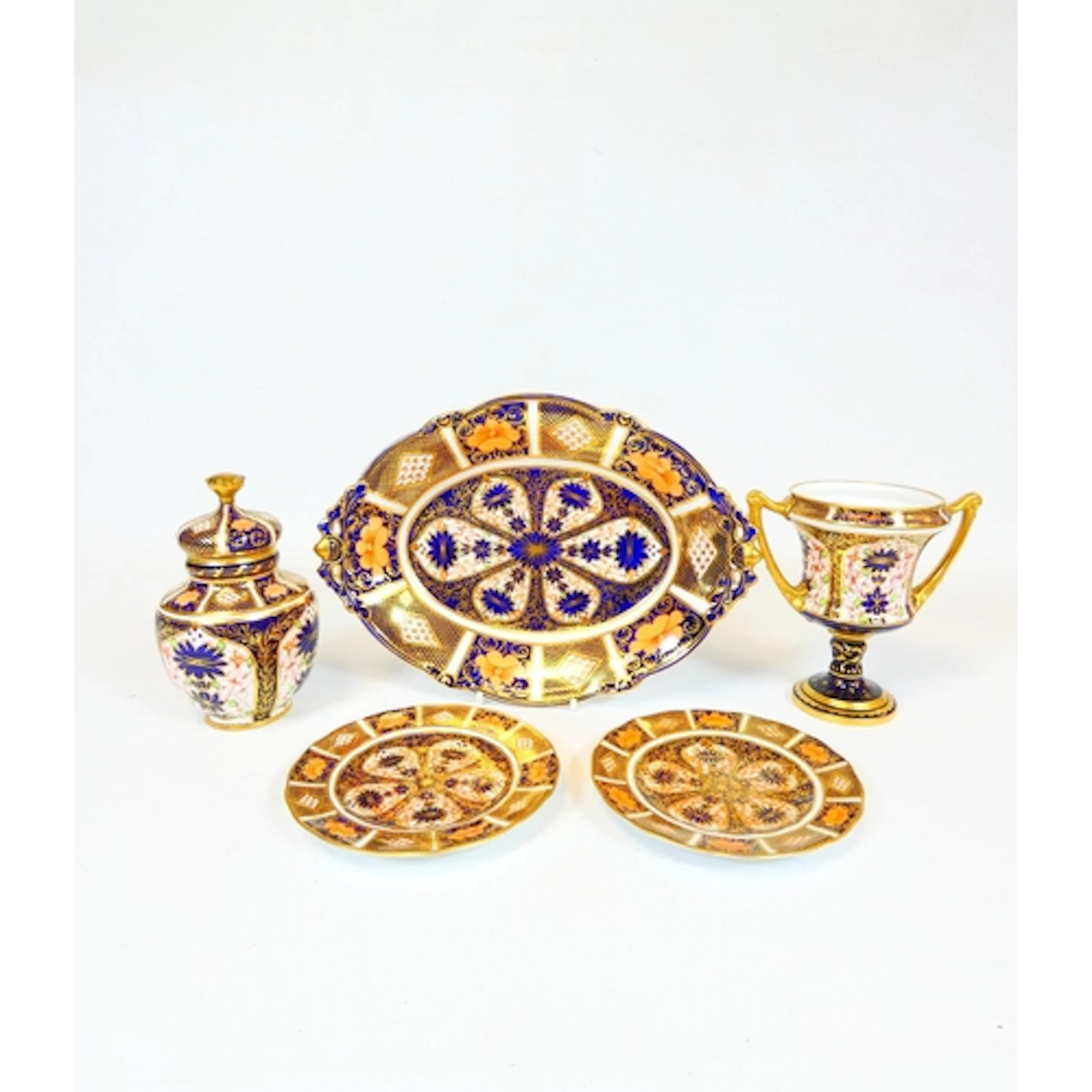 Royal Crown Derby. A group Imari pattern 1128 porcelain comp...