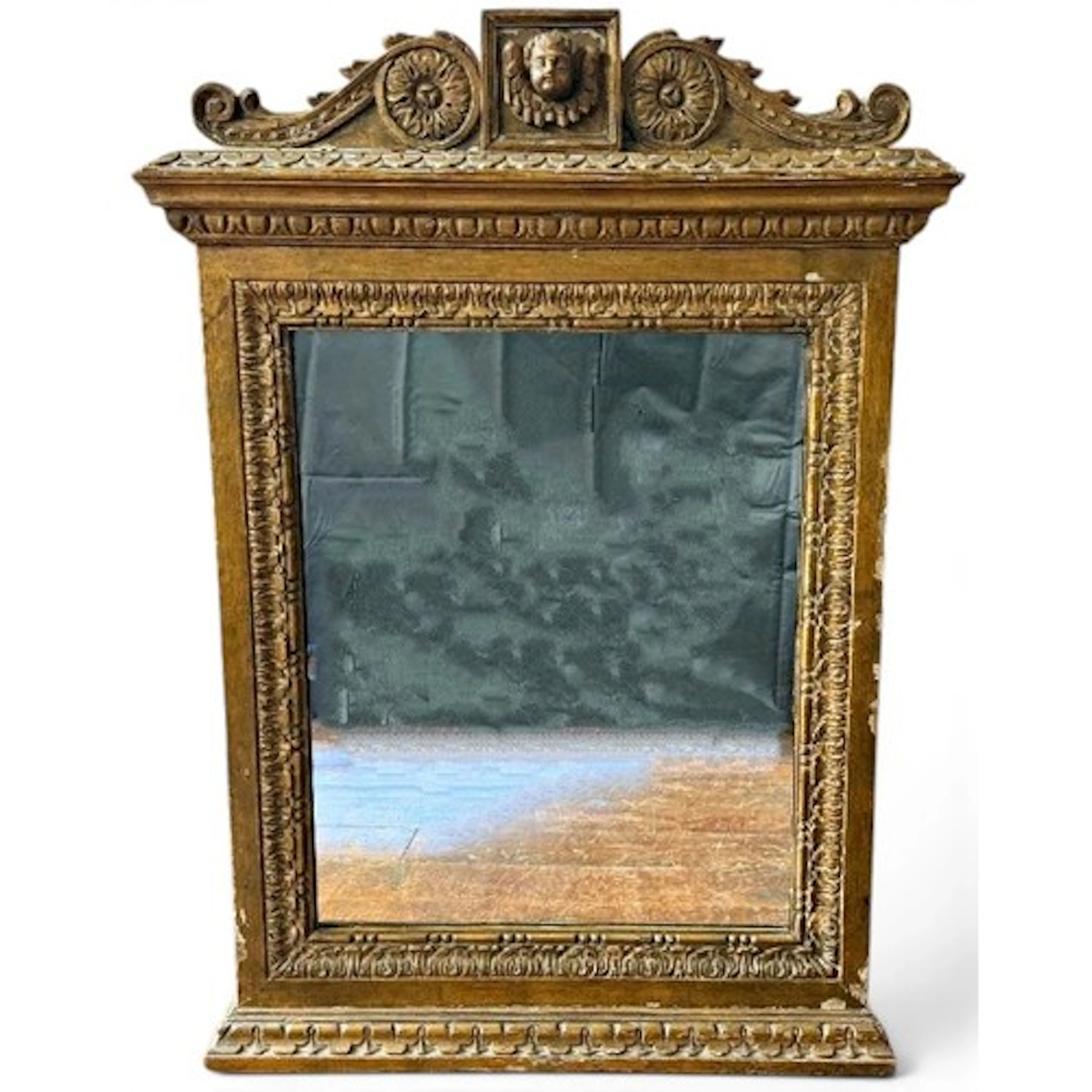 An 18th century carved wood and gilt gesso hanging wall mirr...