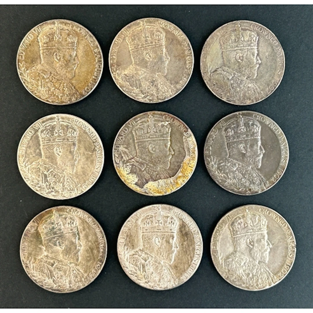A collection of nine official Royal Mint Edward VII Coronati...