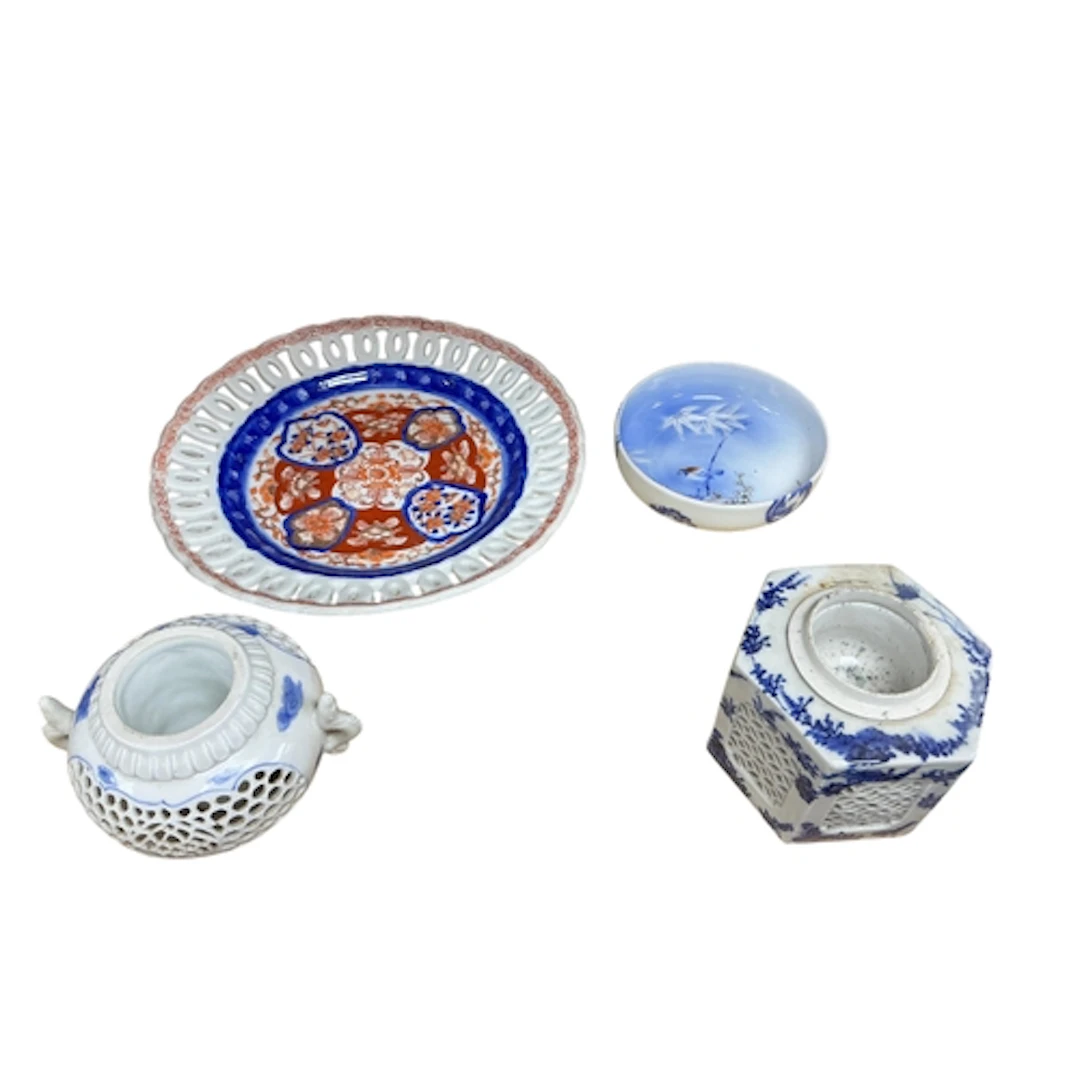 Four pieces of Japanese porcelain to include a Hirado reticu...