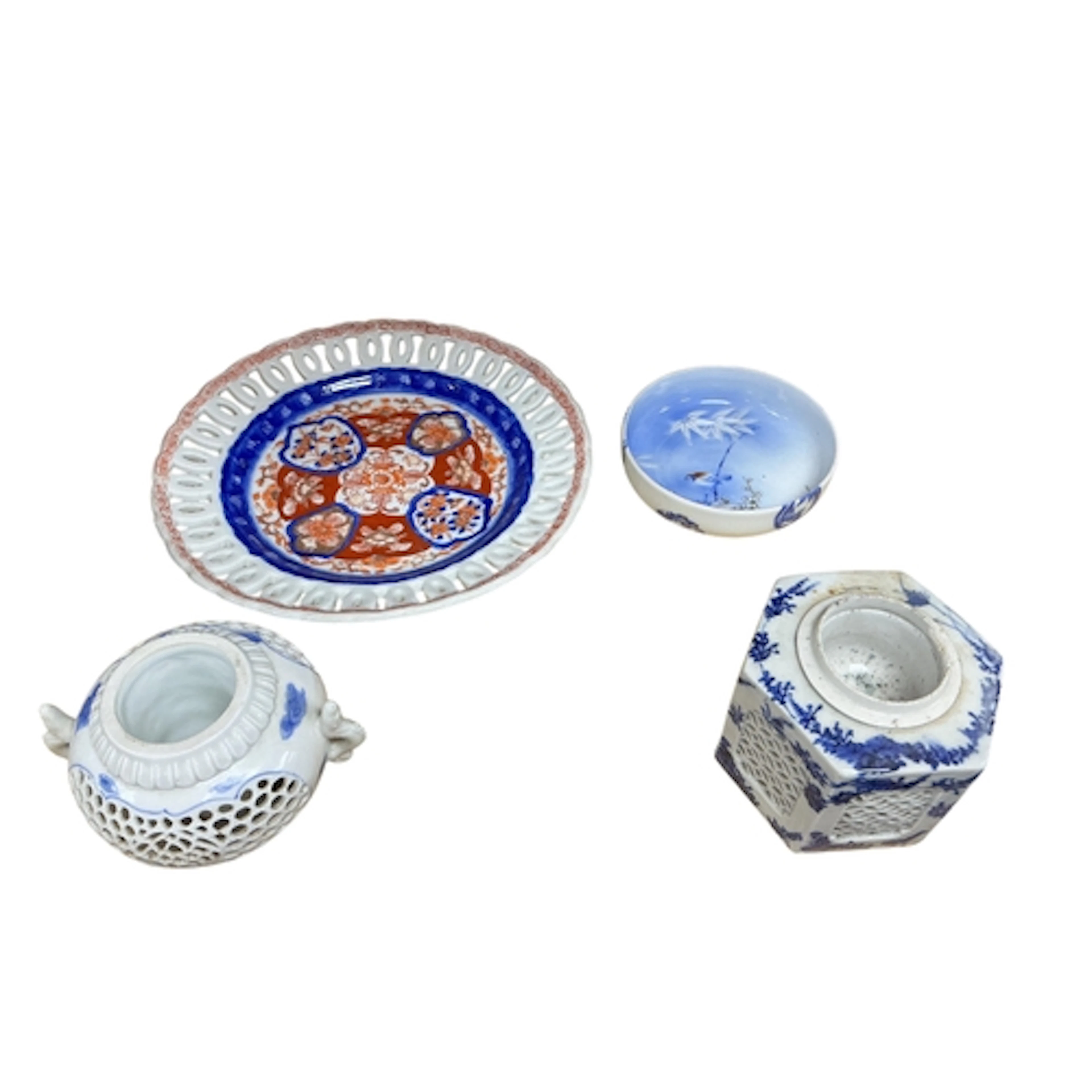 Four pieces of Japanese porcelain to include a Hirado reticu...