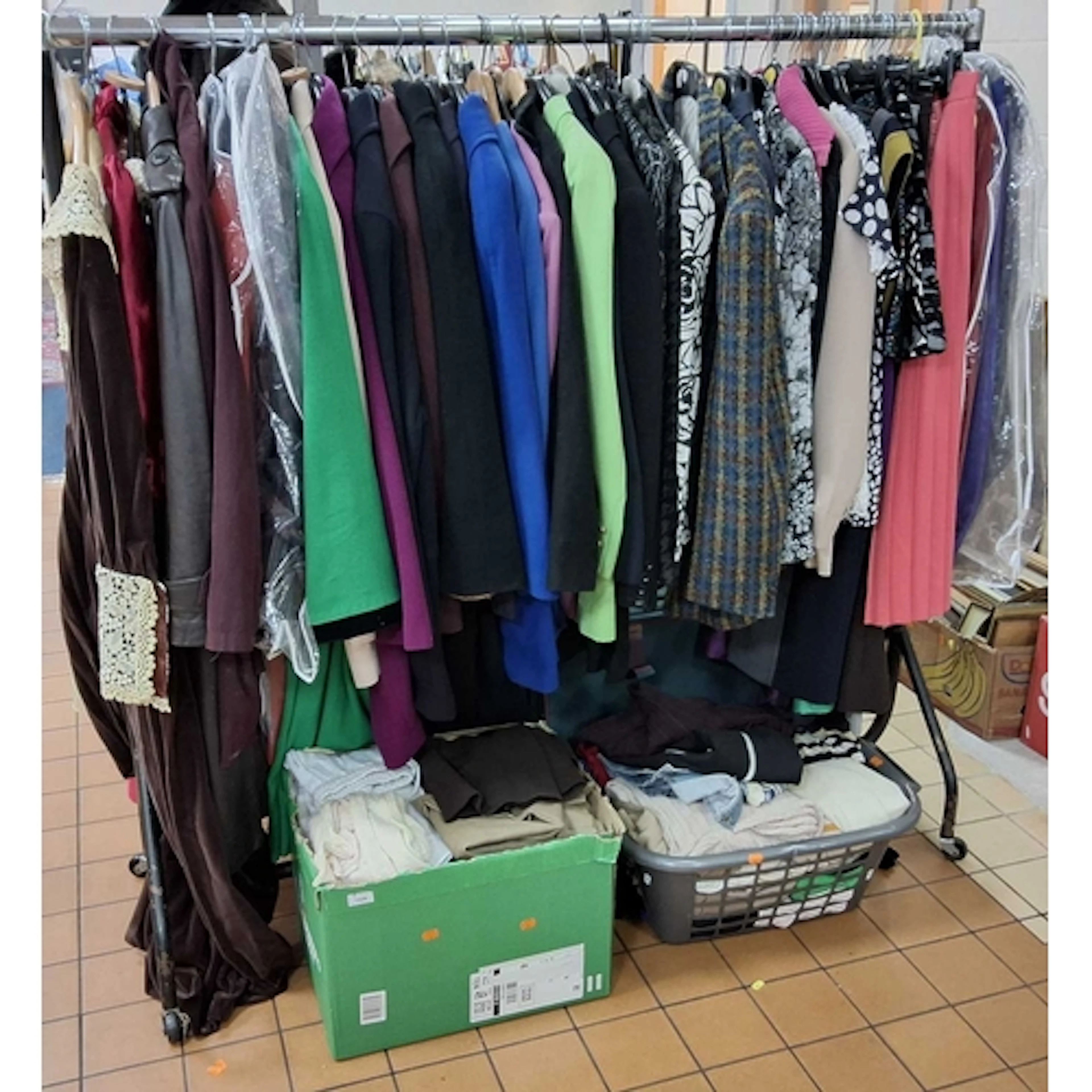TWO BOXES AND LOOSE WOMENS CLOTHES AND A VINTAGE SUITCASE, a...