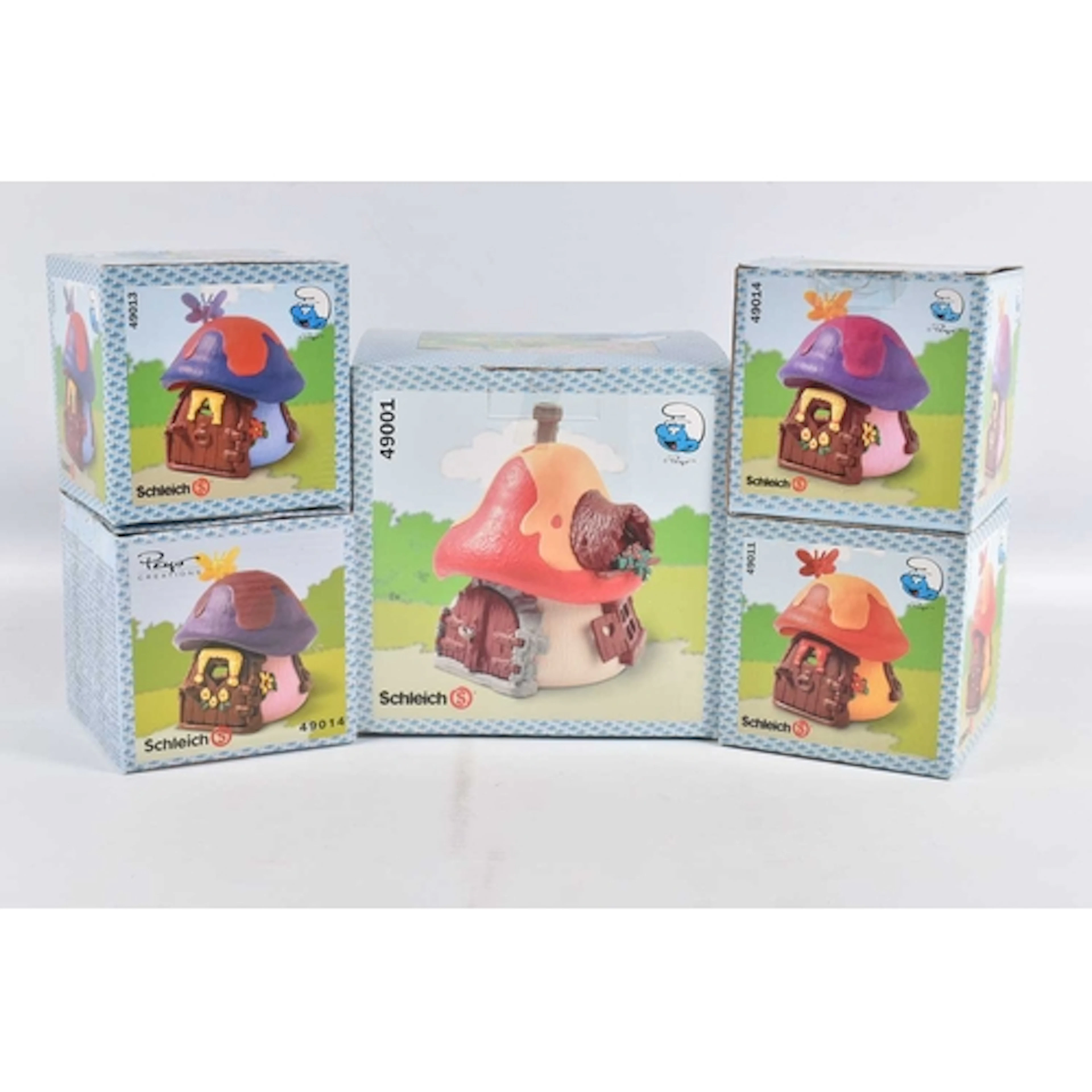 A COLLECTION OF FIVE BOXED COLLECTIBLE SCHLEICH PEYO SMURF M...