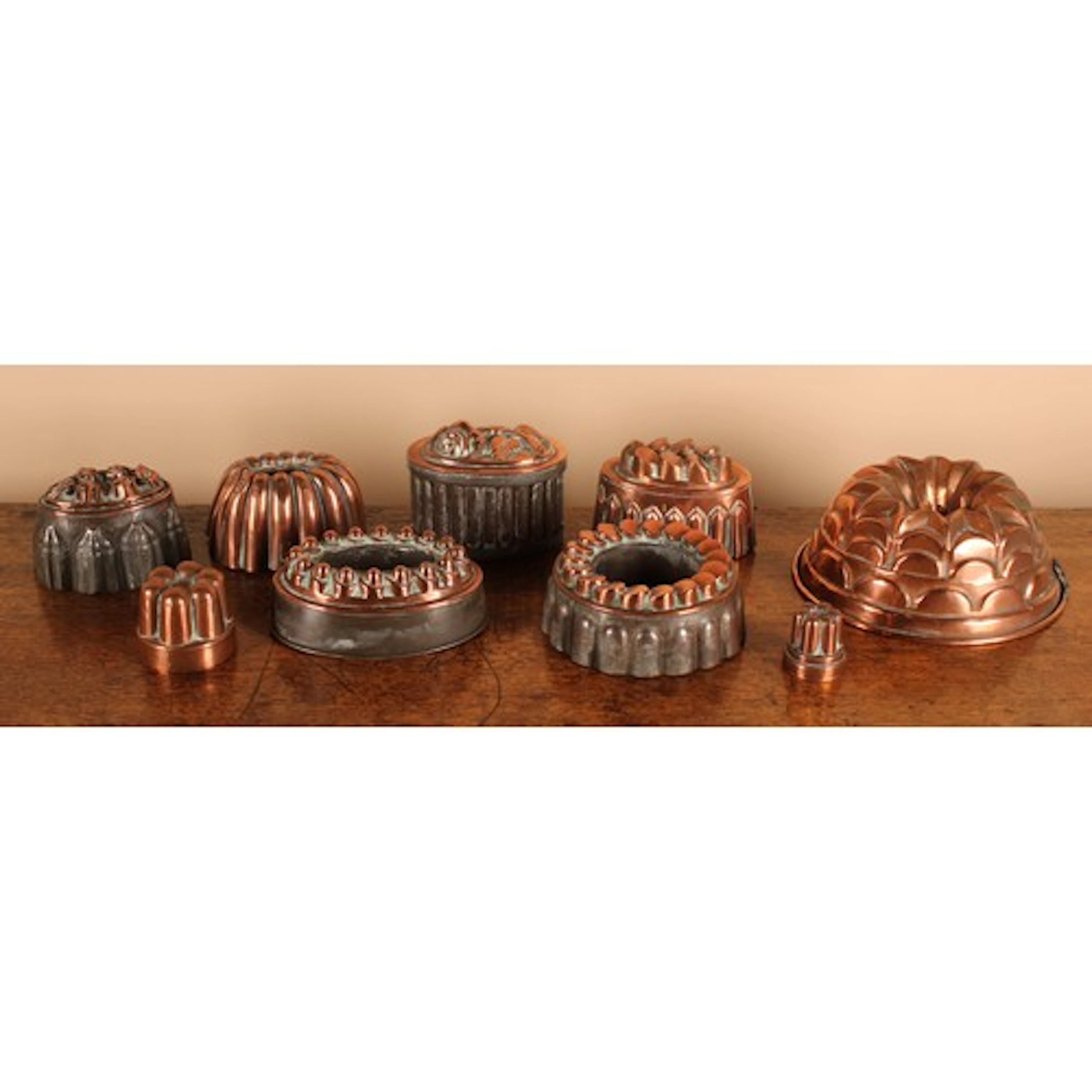 A 19th century copper and tinned metal oval jelly mould, the...