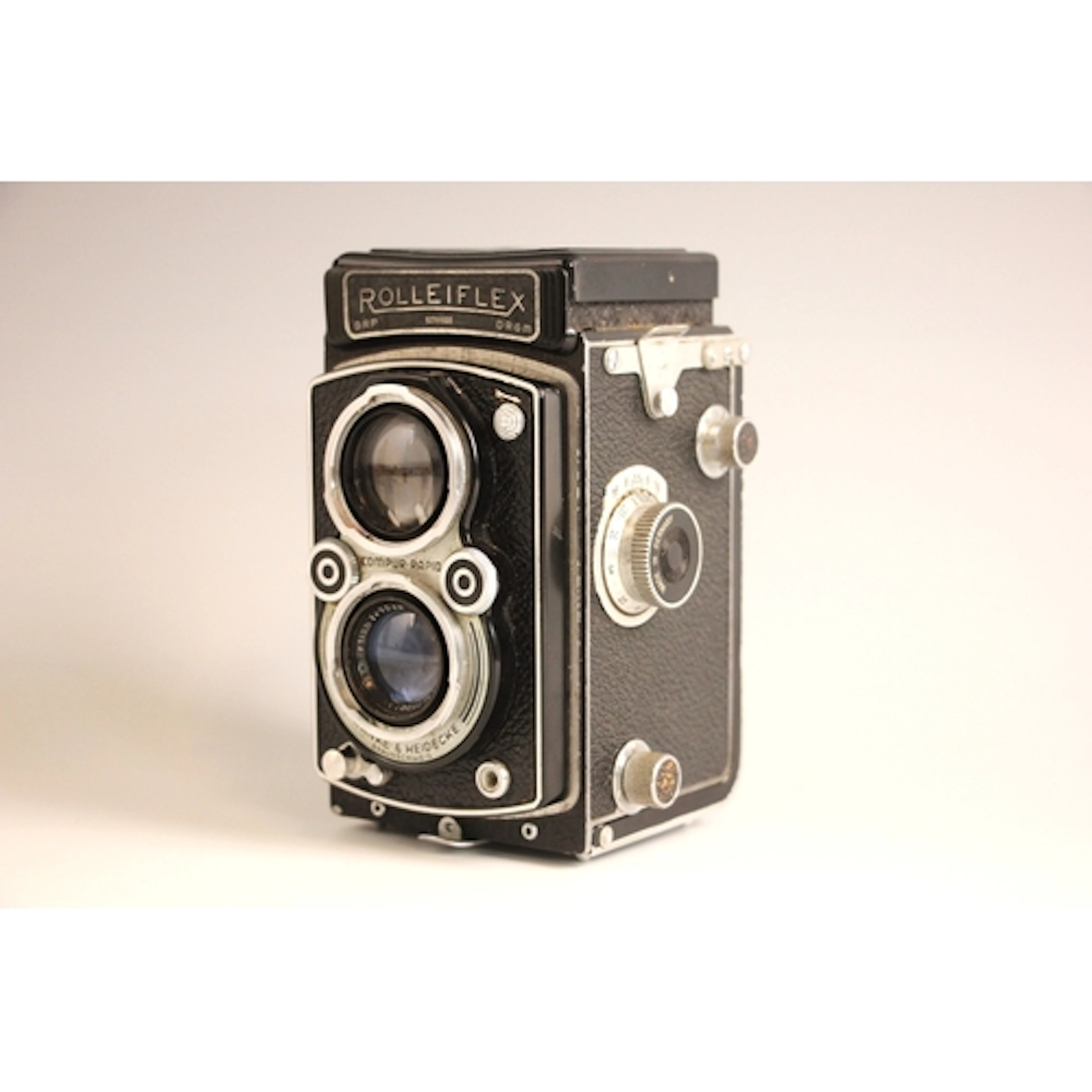 A Rolleiflex DRP DRGM Compur Rapid twin lens reflex camera, ...