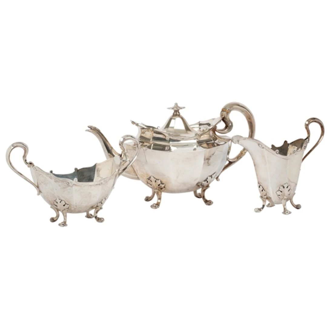 A George V Scottish silver three piece tea set, by James Bal...