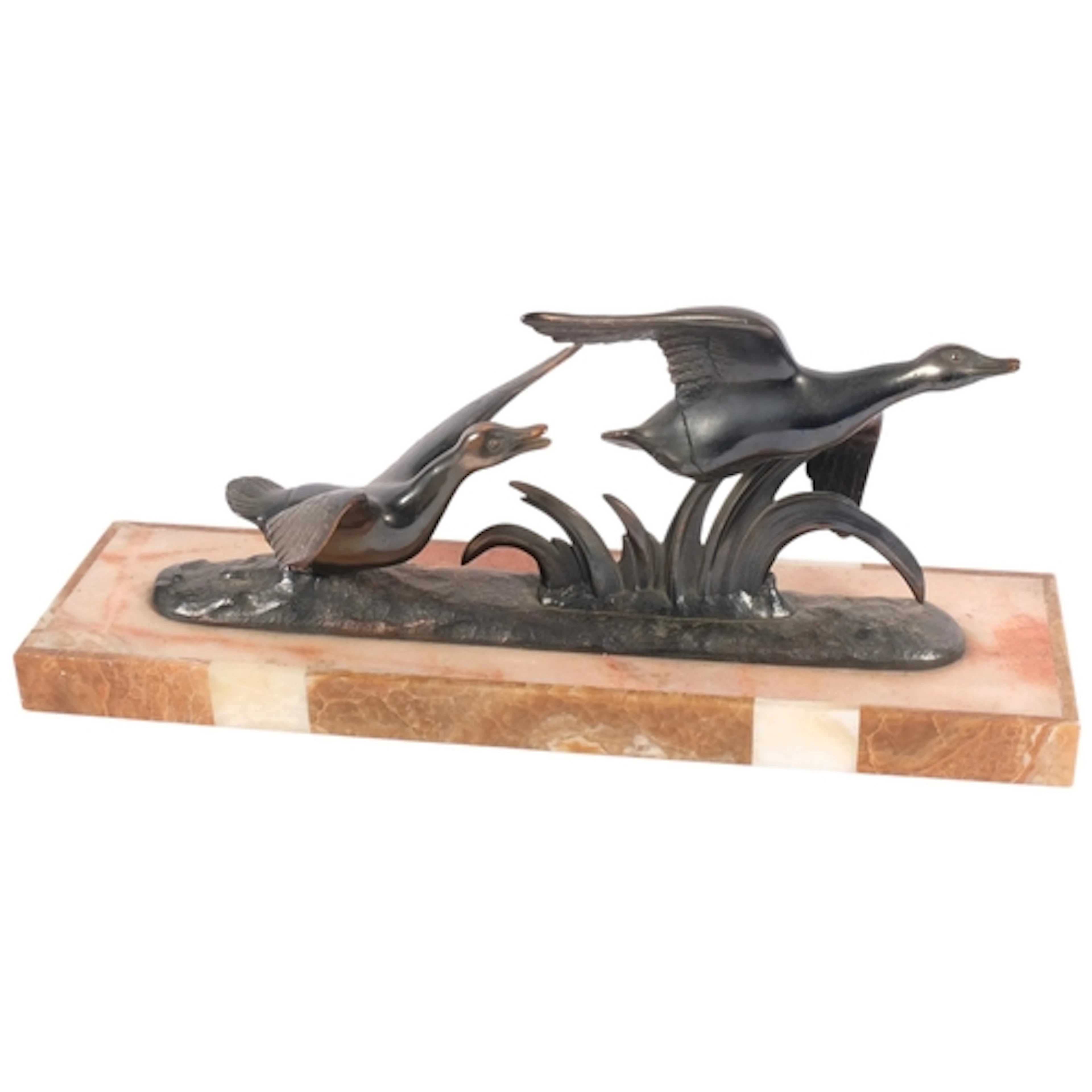 An Art Deco spelter sculpture, flying ducks mounted on a two...