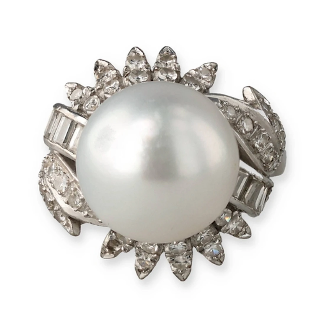 A 14CT WHITE GOLD, DIAMOND AND PEARL RING Diamonds variously...