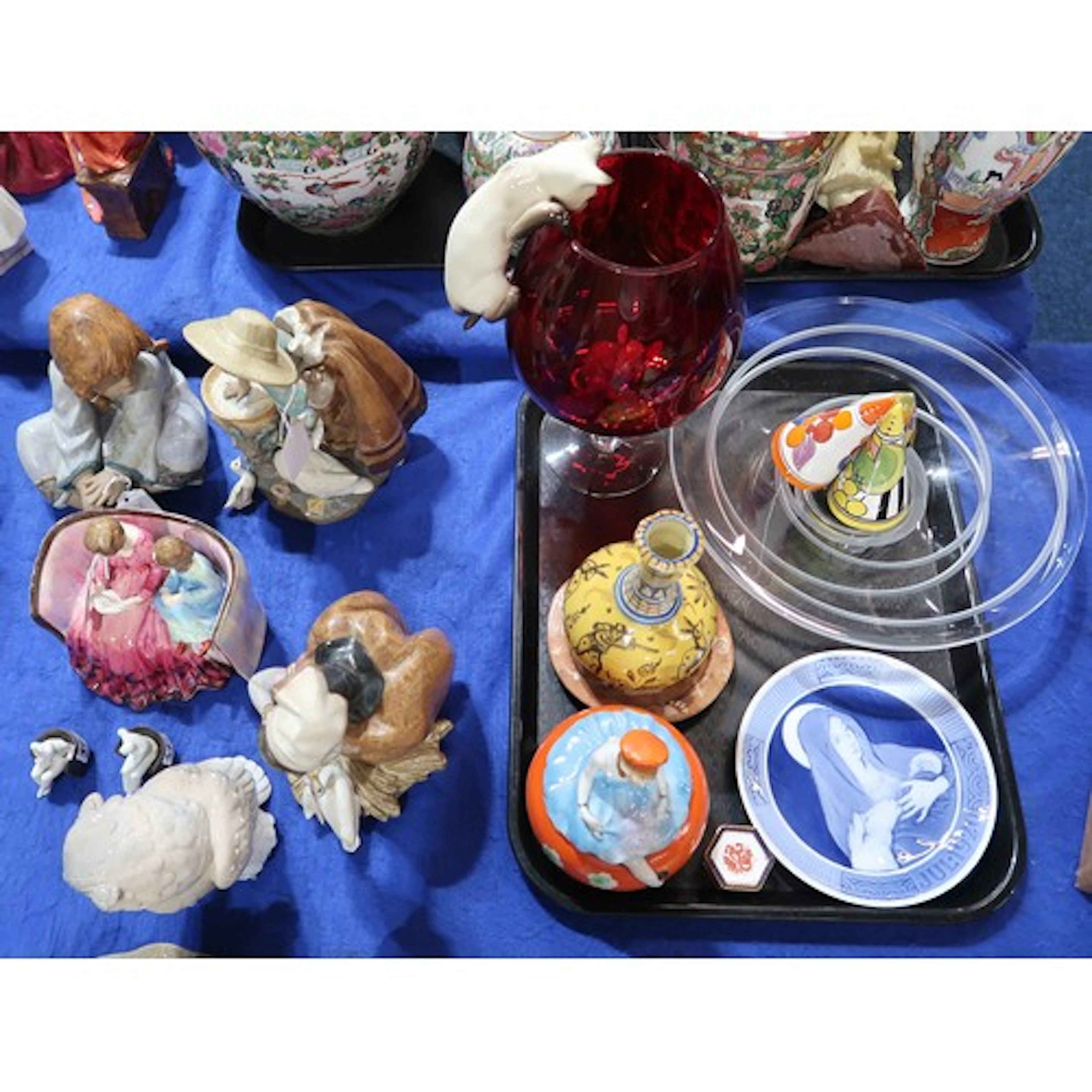 A Paragon group of a mother and child sat on a sofa, three L...