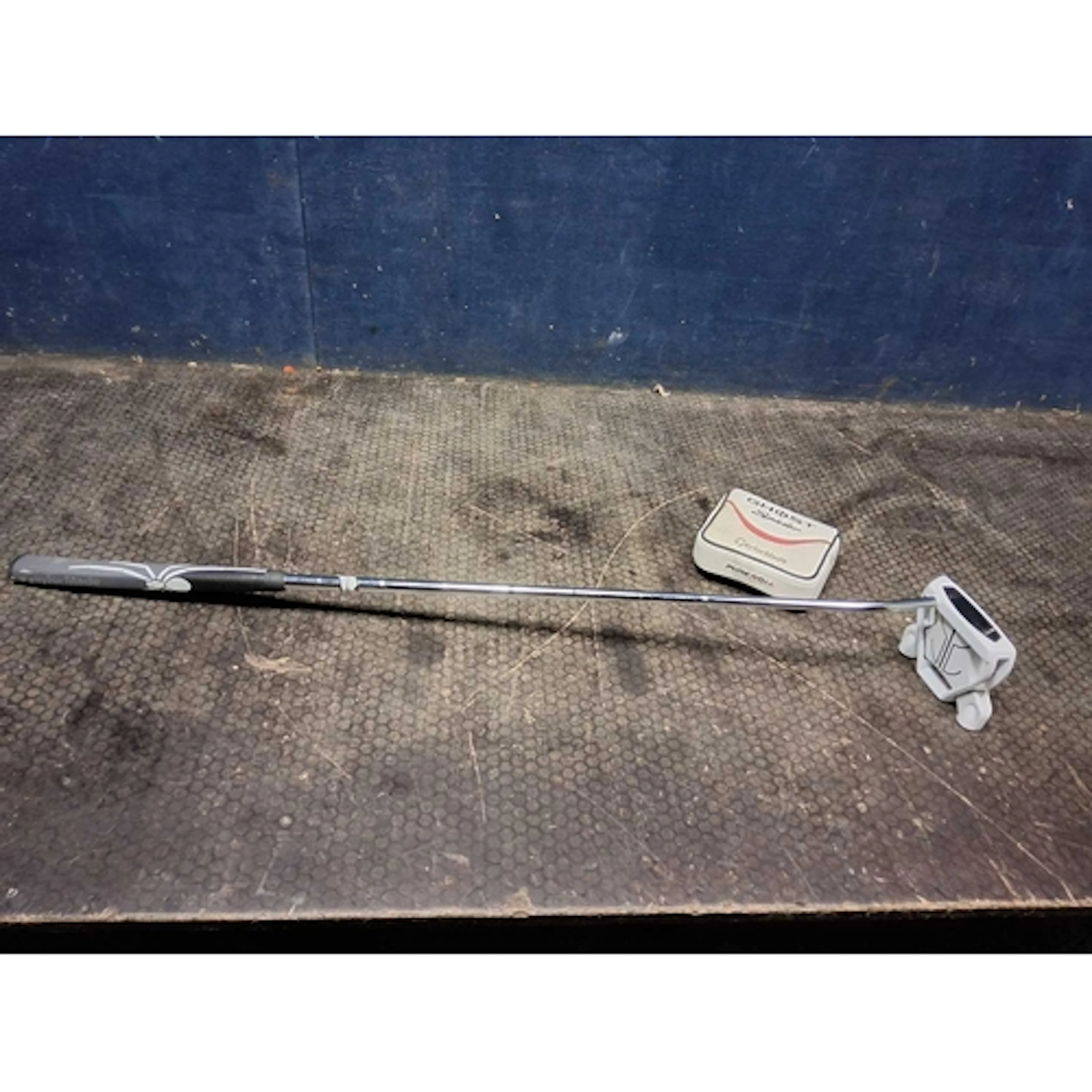 A TAYLOR MADE GHOST SPIDER PUTTER with cover