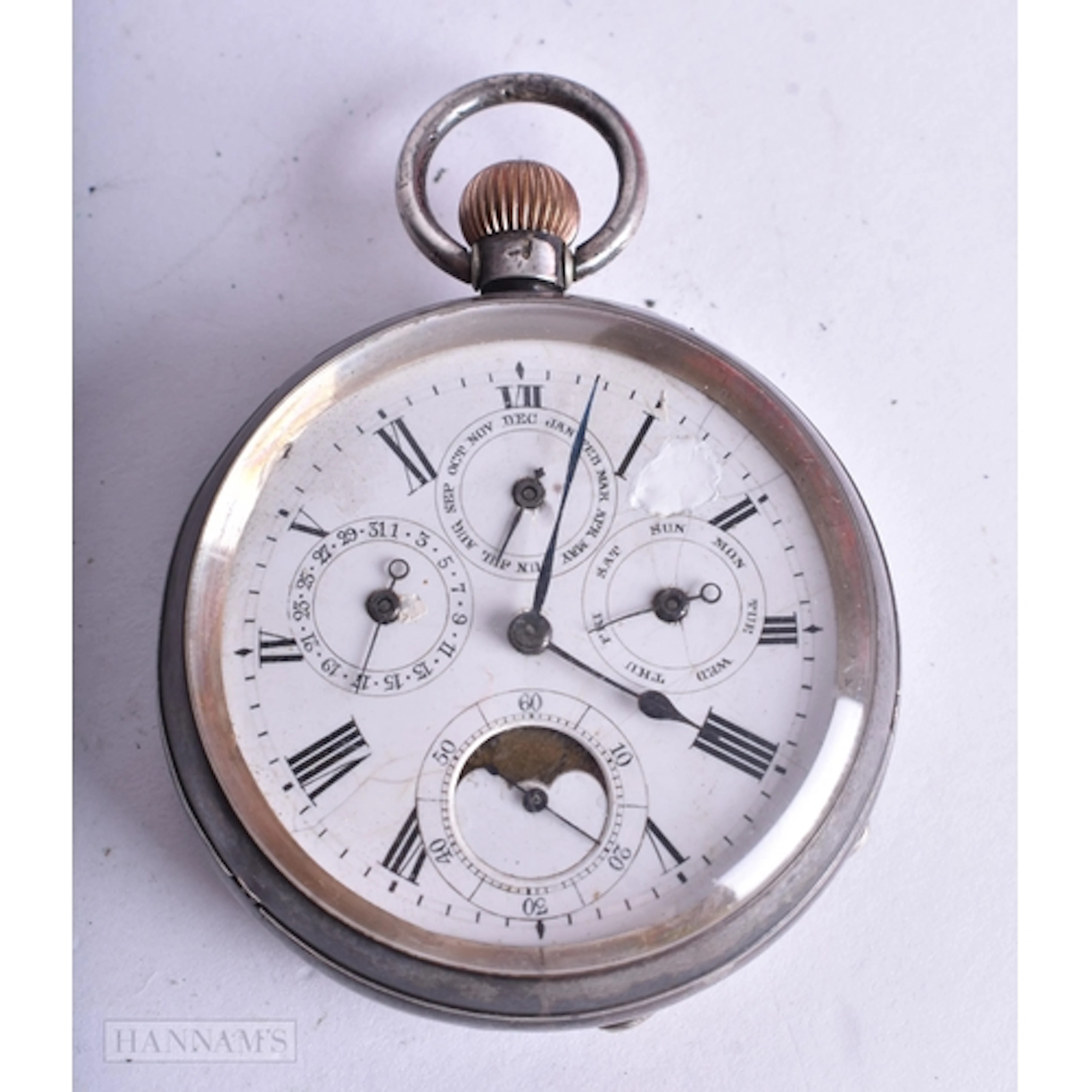 AN ANTIQUE SILVER MOONPHASE POCKET WATCH. Running. 110.4 gra...
