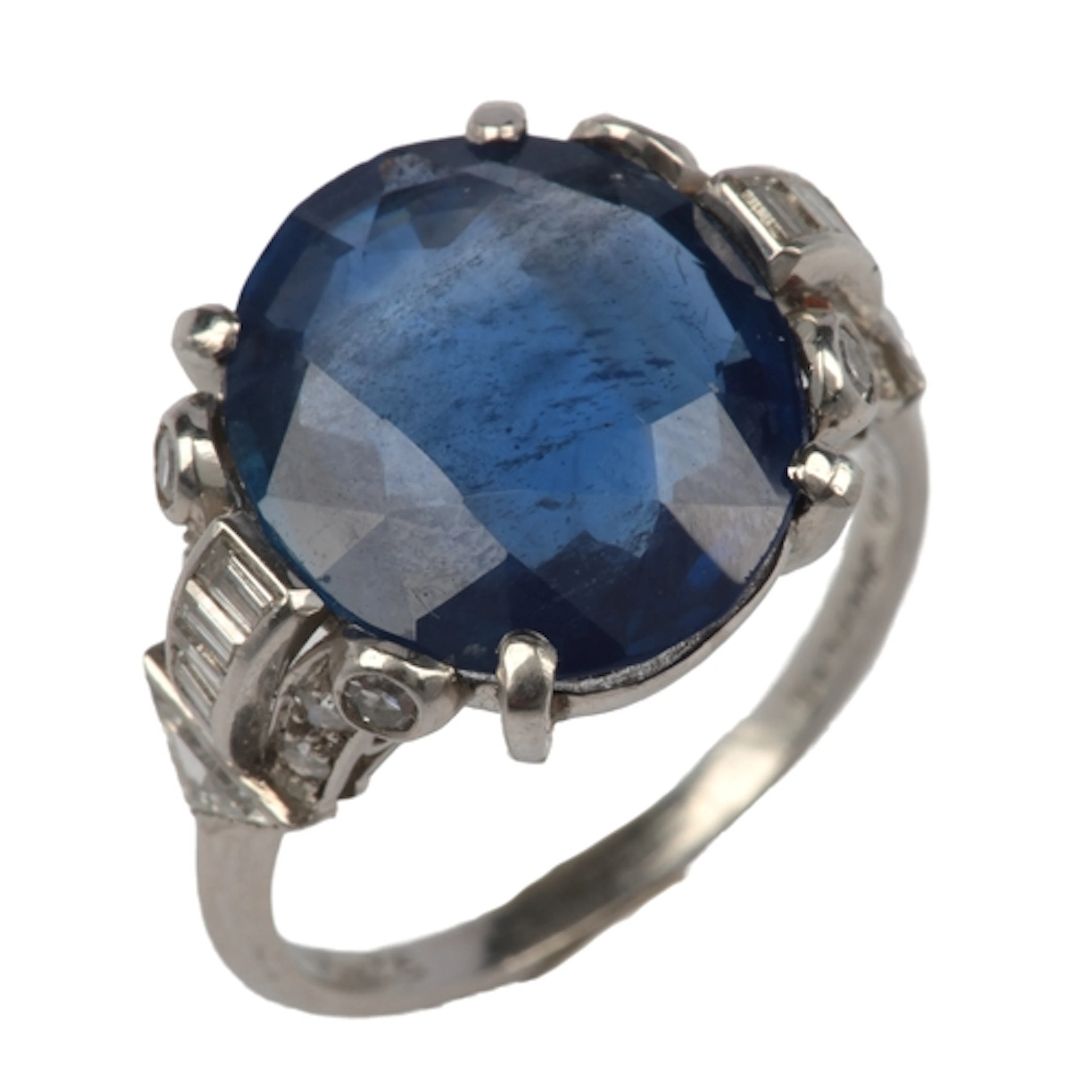 A fine Art Deco sapphire and diamond ring, possibly American...