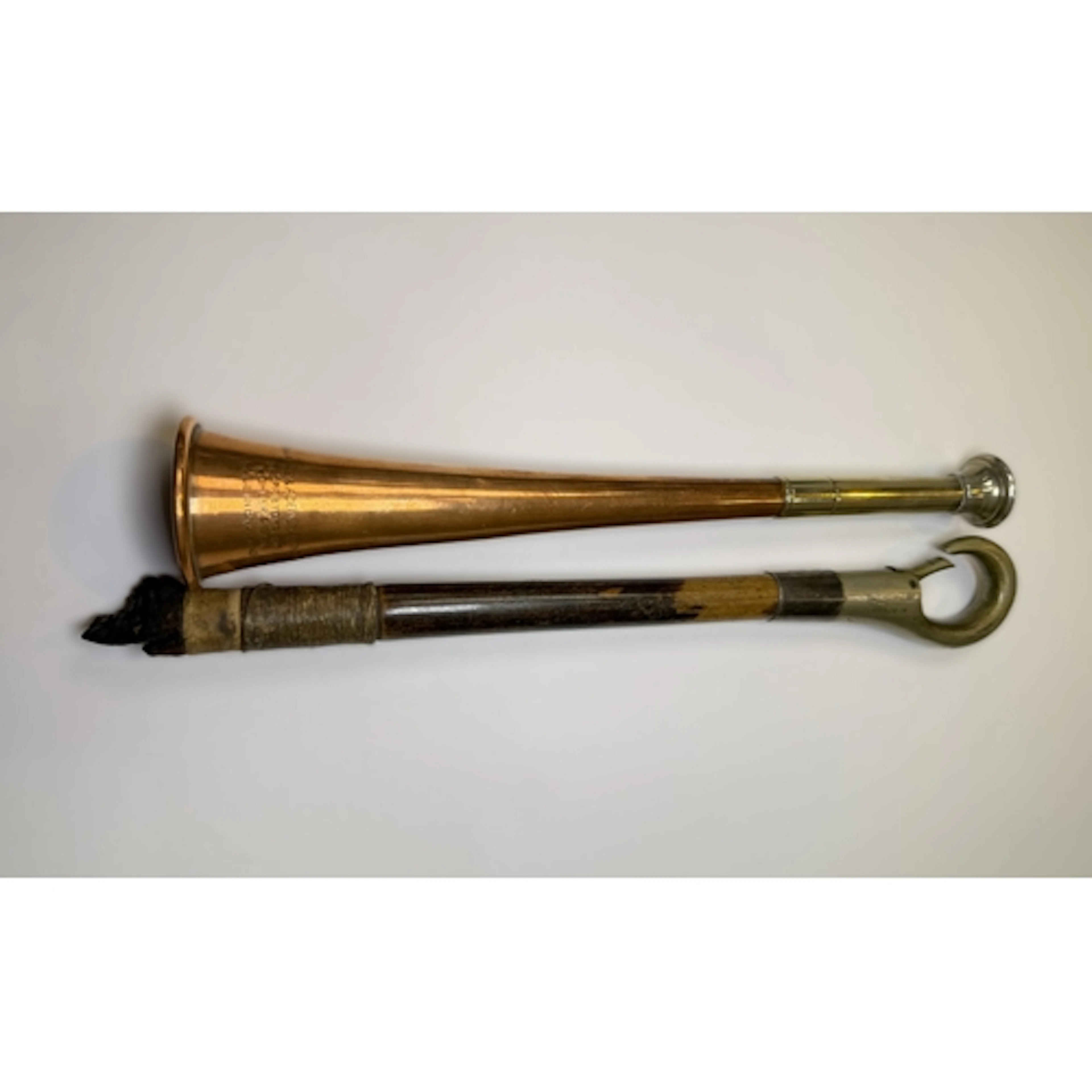 A Blackwells whip with hallmarked silver collar and a copper...