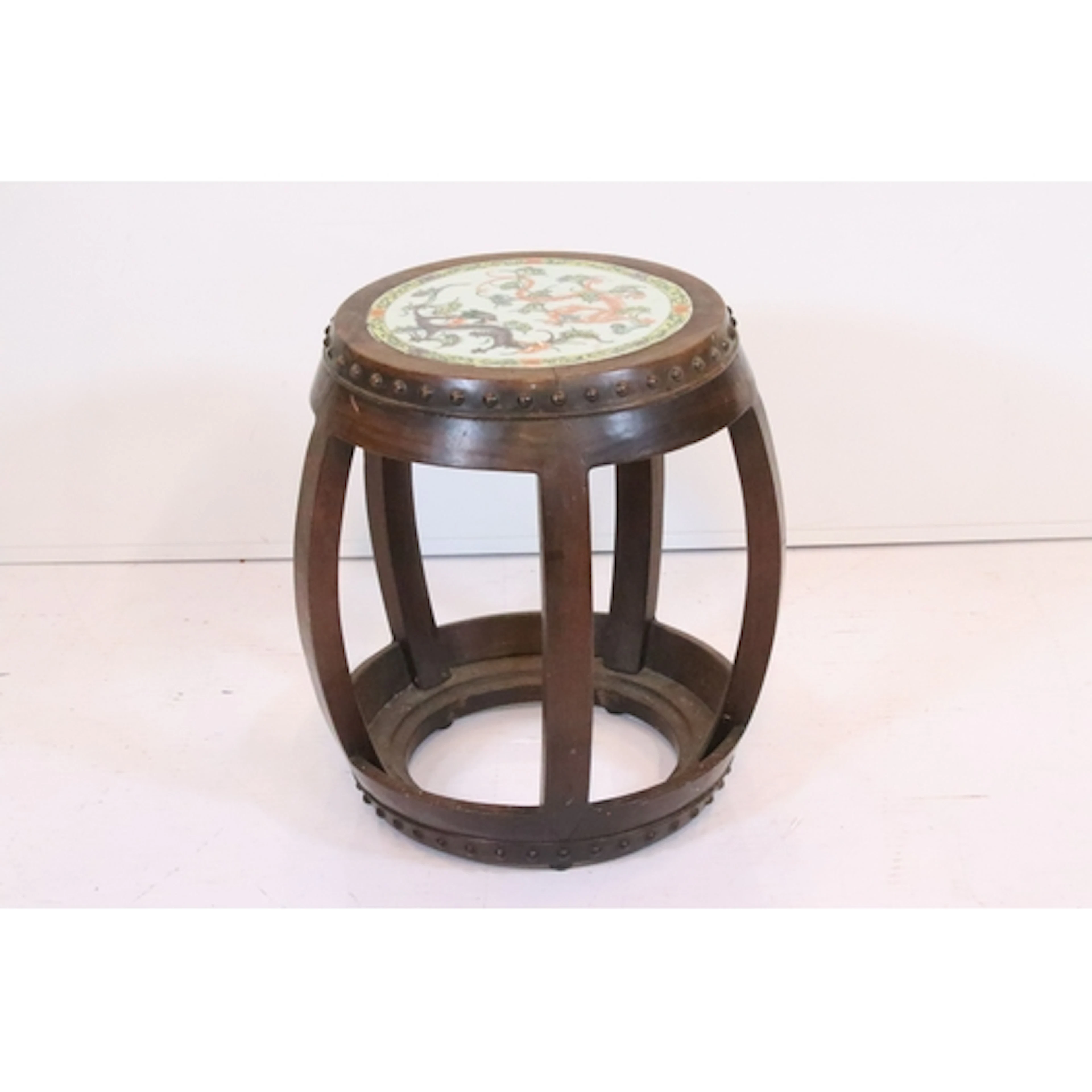 20th century Chinese hardwood barrel stool, the top inset wi...