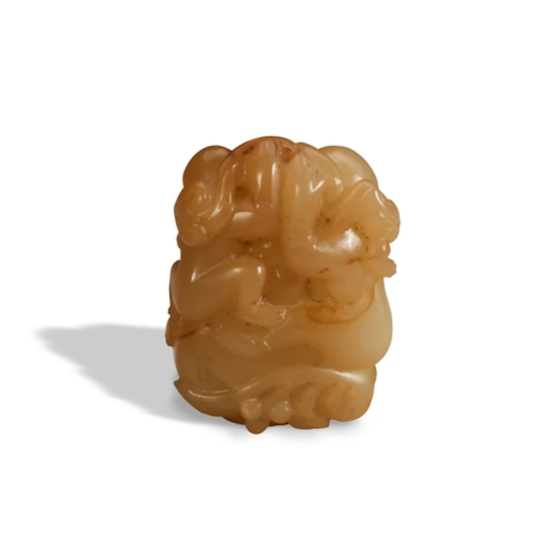 A YELLOW JADE 'BOYS AND DRUM' PENDANT QING DYNASTY, 18TH / 1...