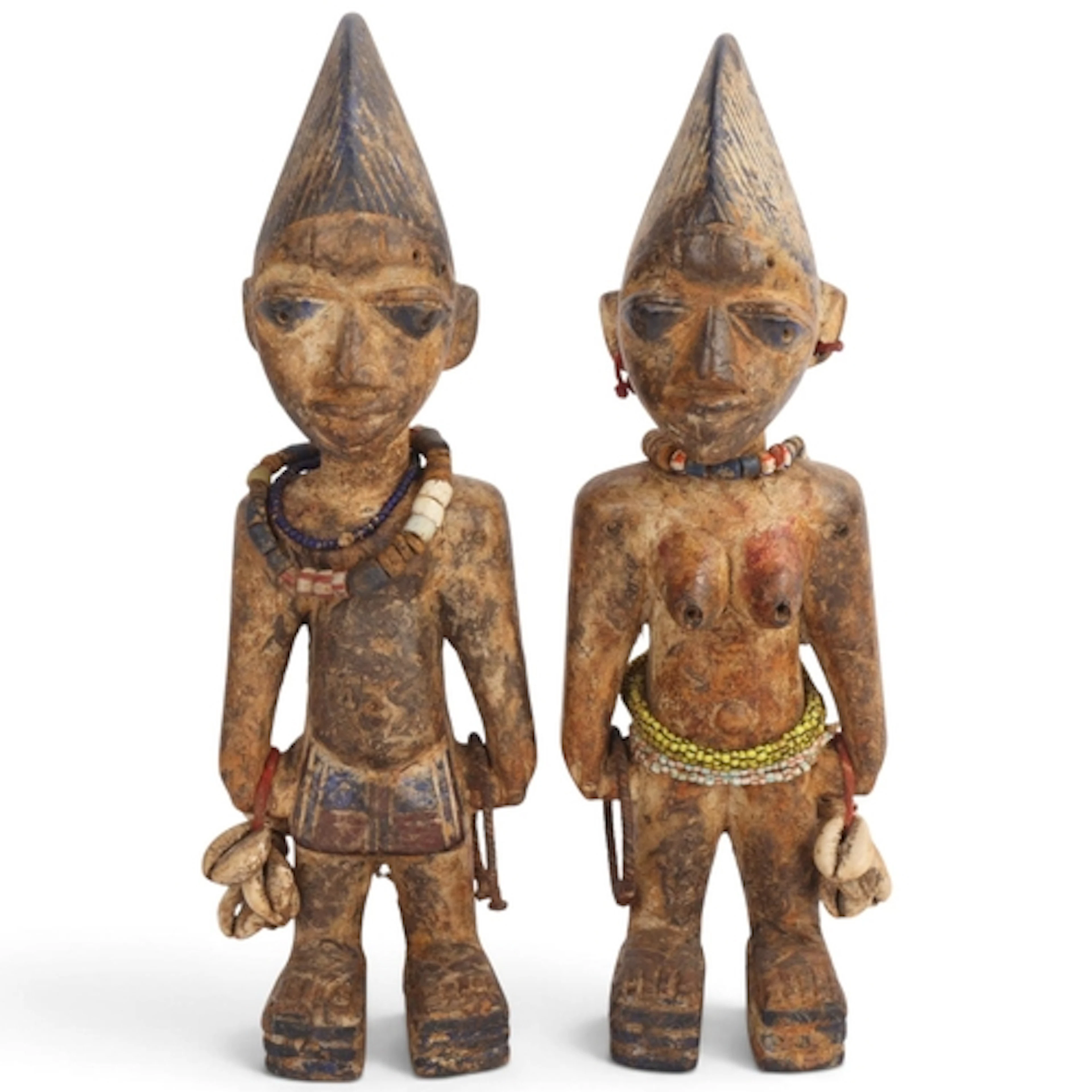 Pair of Yoruba Ibeji figures, Nigeria, carved and painted wo...