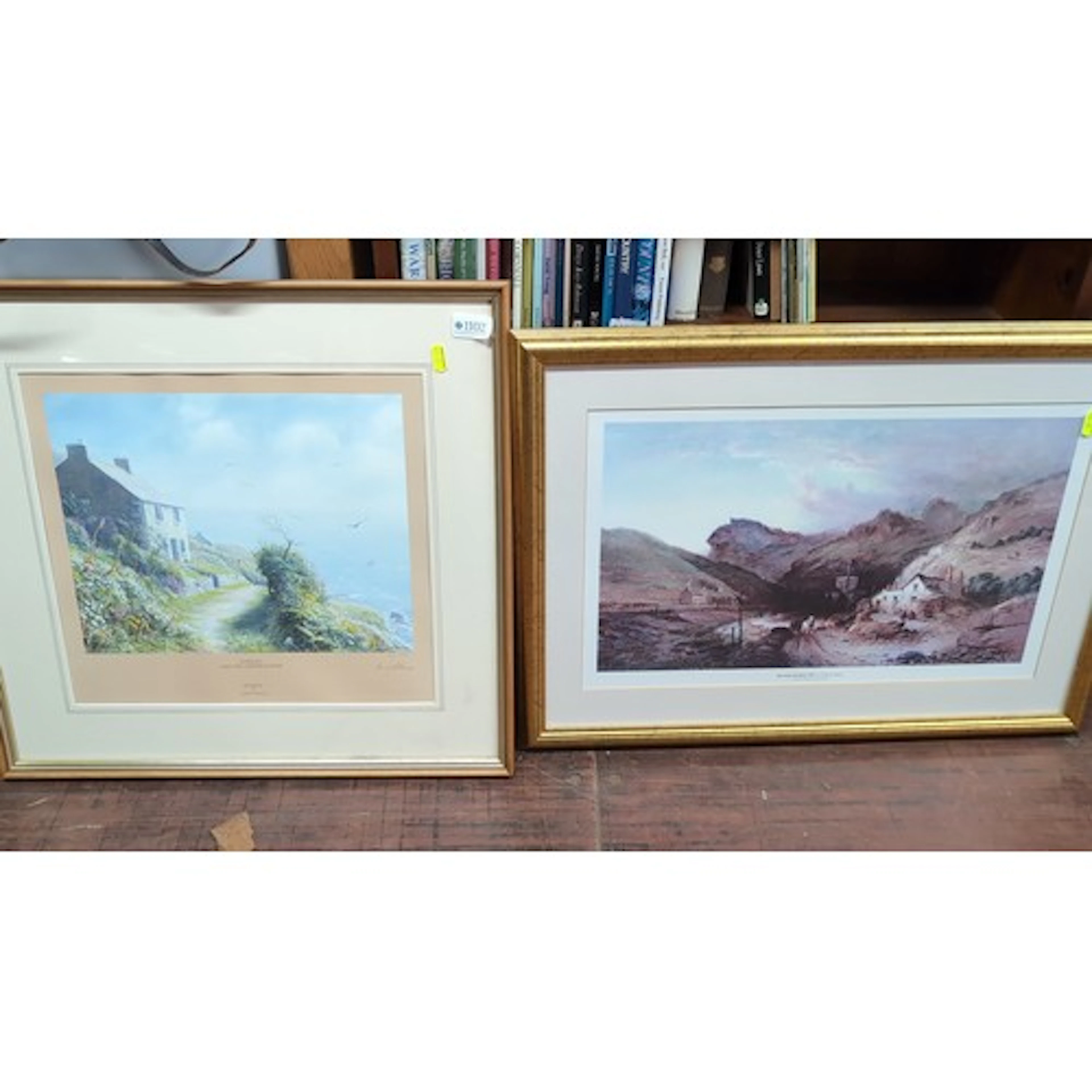 A pair of framed colour prints after Cornish coastal views: ...