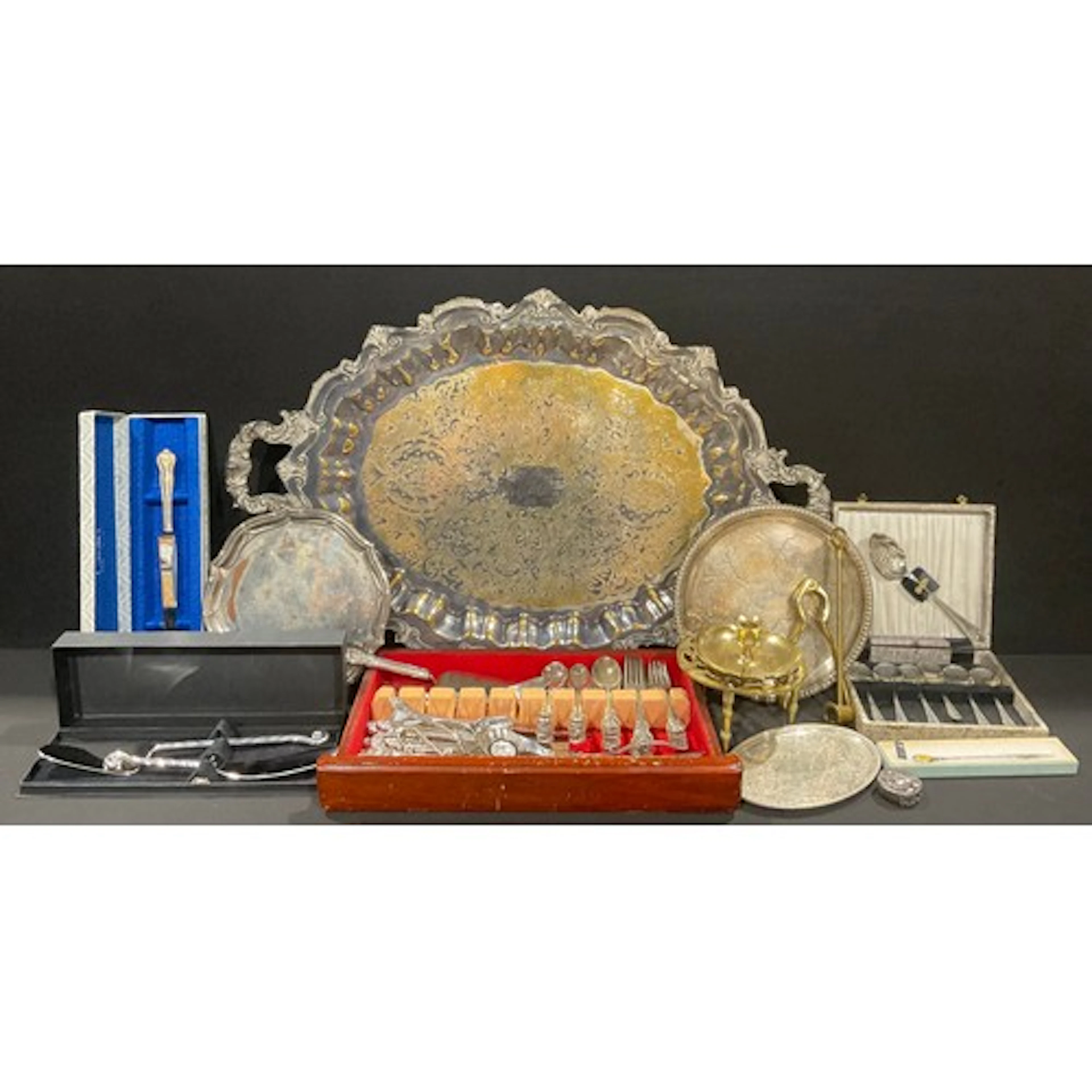 A large silver plated shaped oval twin handled tray; two sa...