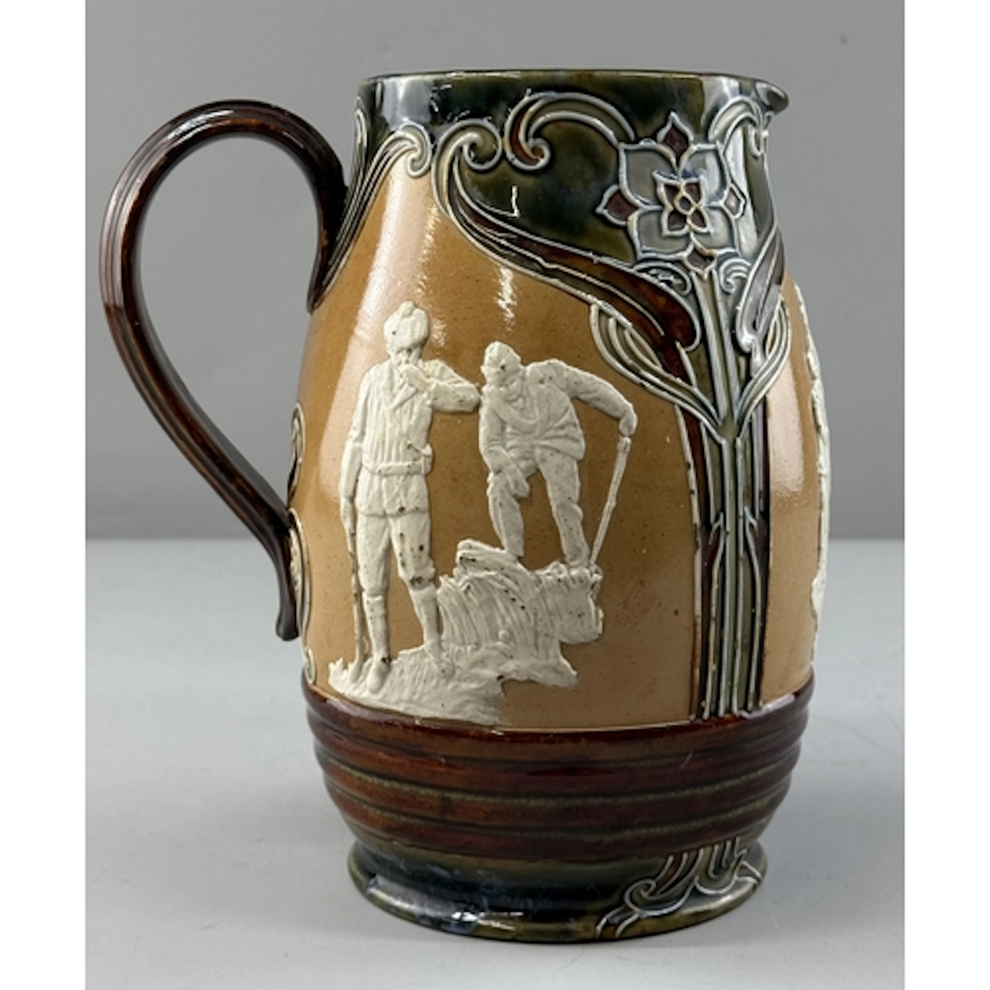 A Doulton Lambeth stoneware jug of golfing interest, late 19...