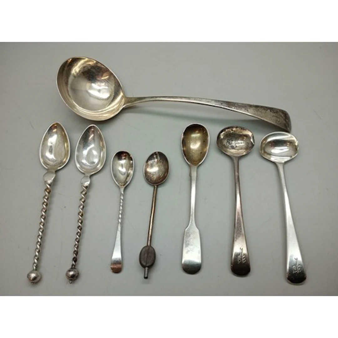 A collection of silver spoons including two Marius Hammer .8...