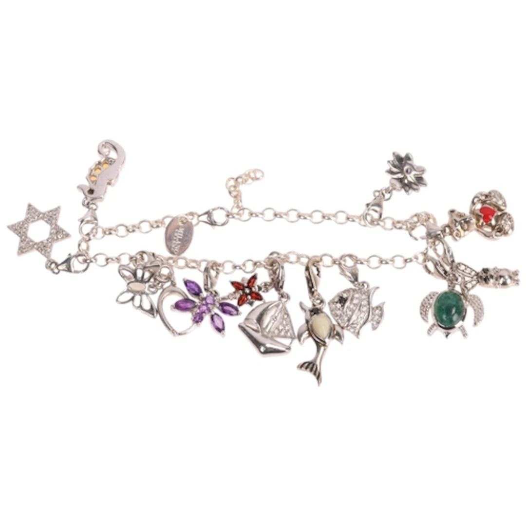 A sterling silver charm bracelet, Milano Charms, with variou...