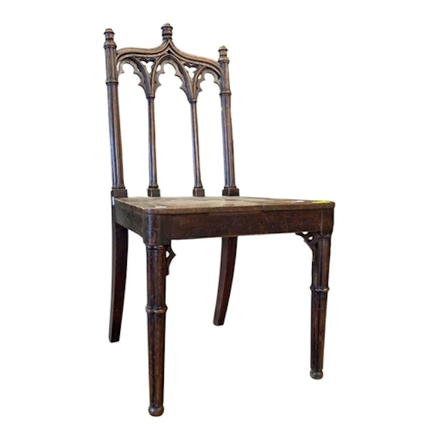 A 19th century Victorian oak ecclesiastical hall chair. The ...