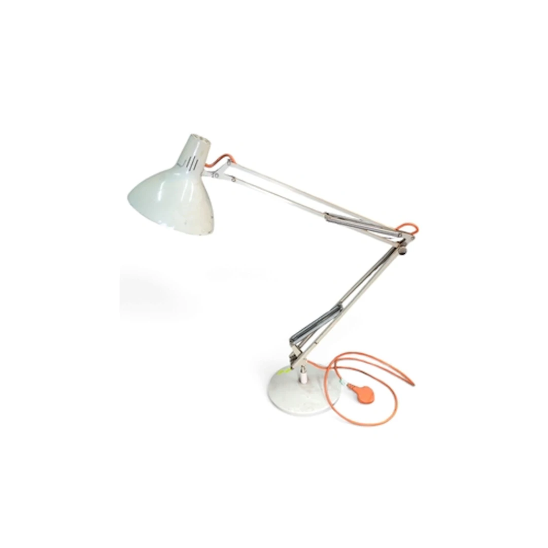 Adjustable metal desk lamp with a spring-balanced articulate...