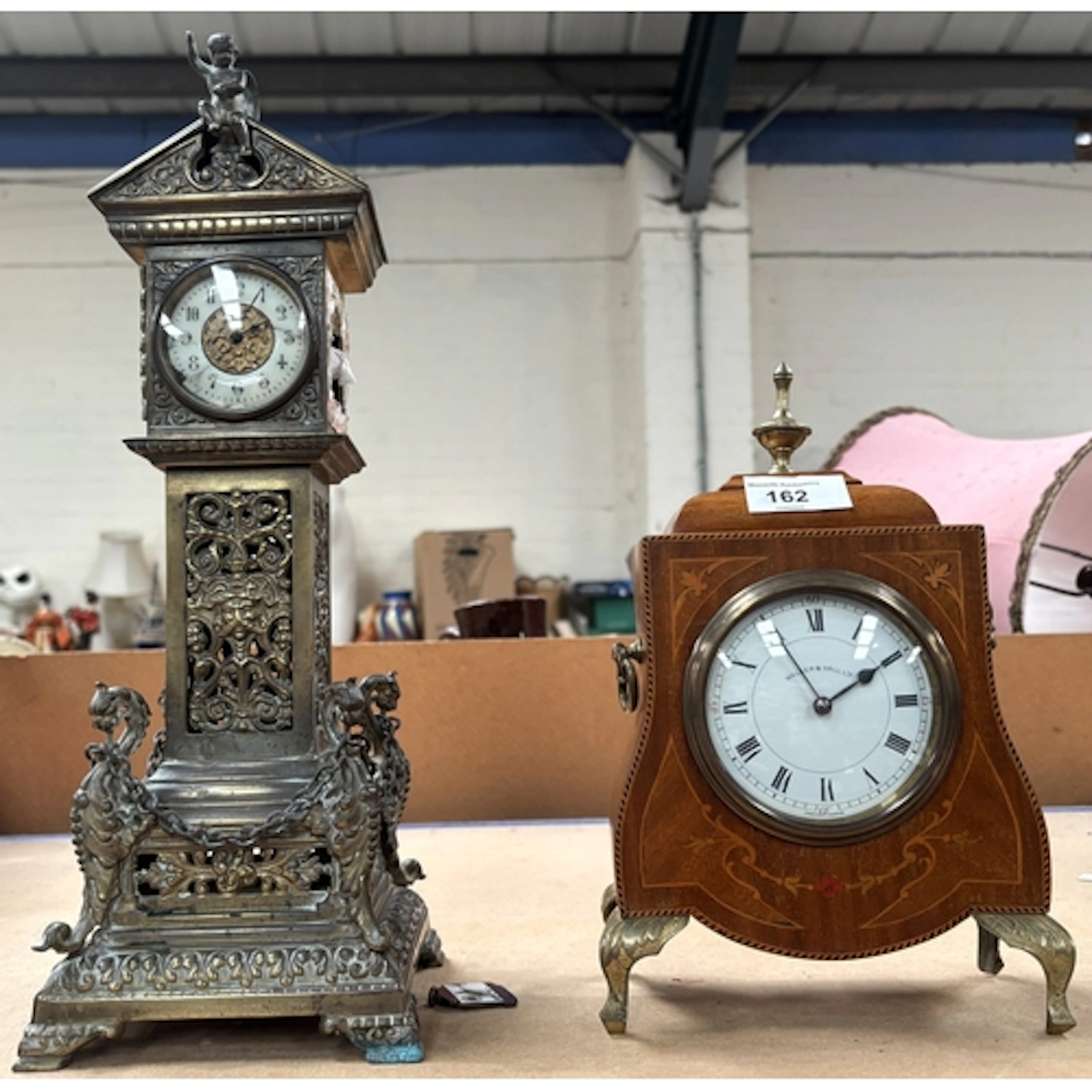A Walker and Hall bracket clock and a brass German tower clo...