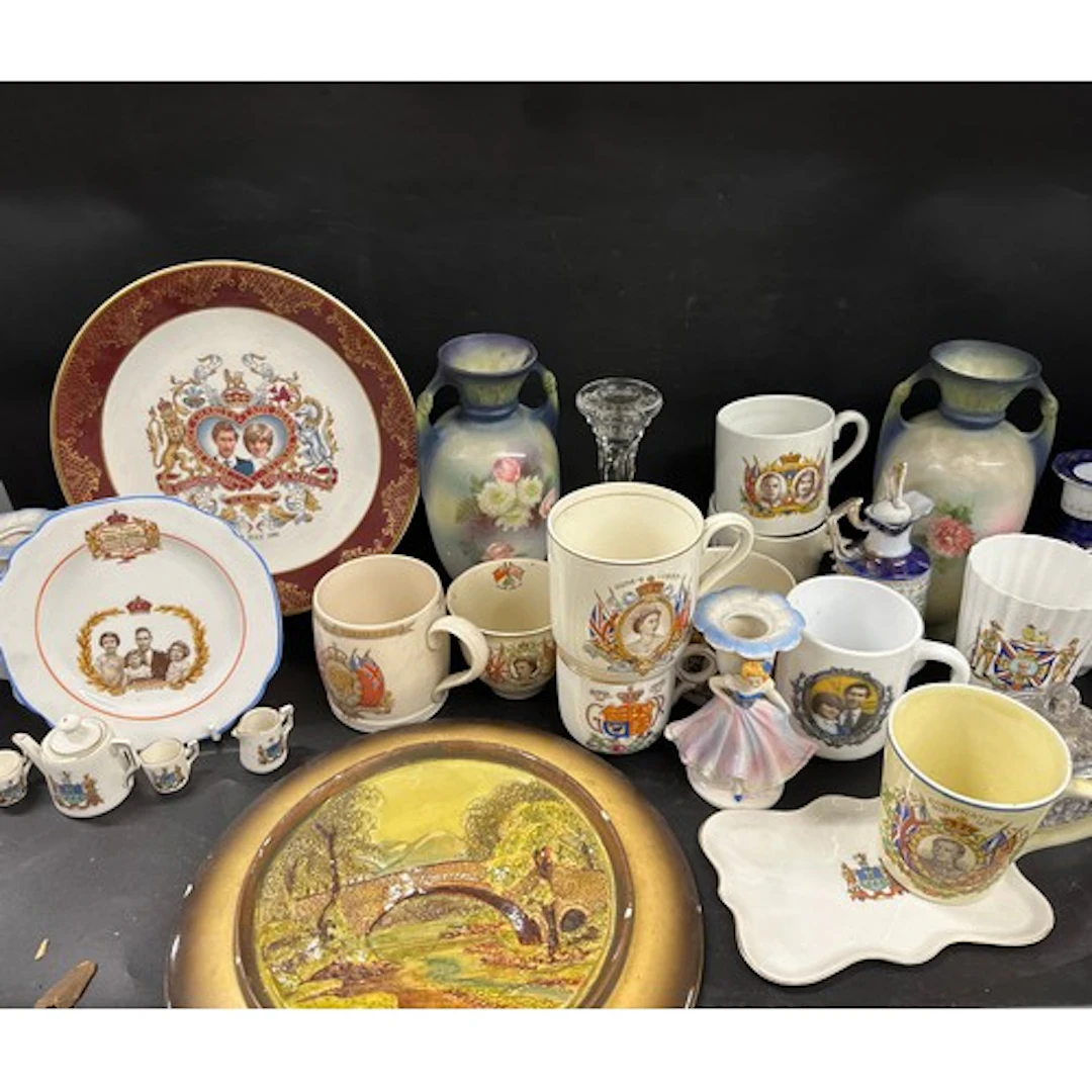 A collection of Coronation ware including mugs, plates along...