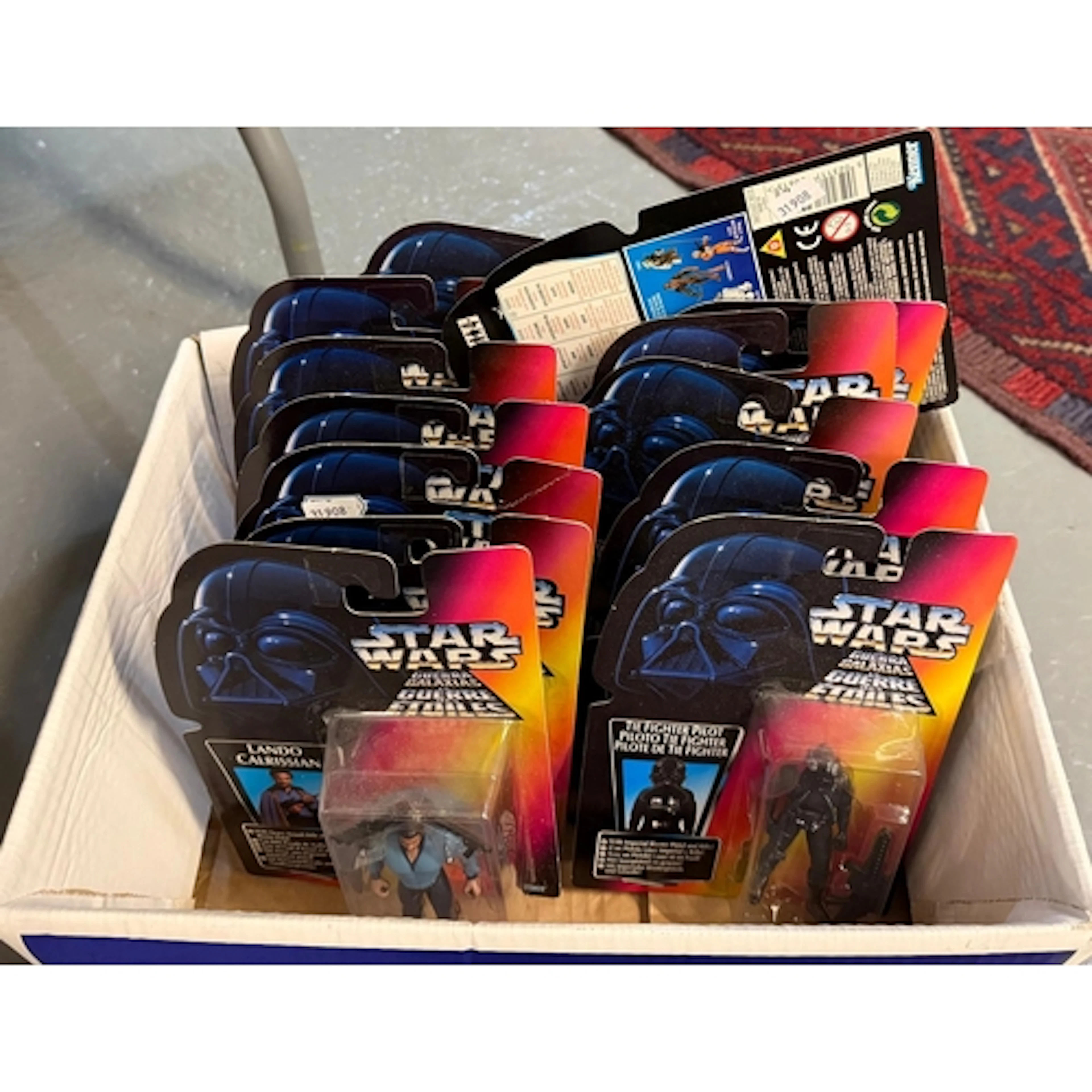 Collection of Kenner Star Wars figurines, the packaging mark...
