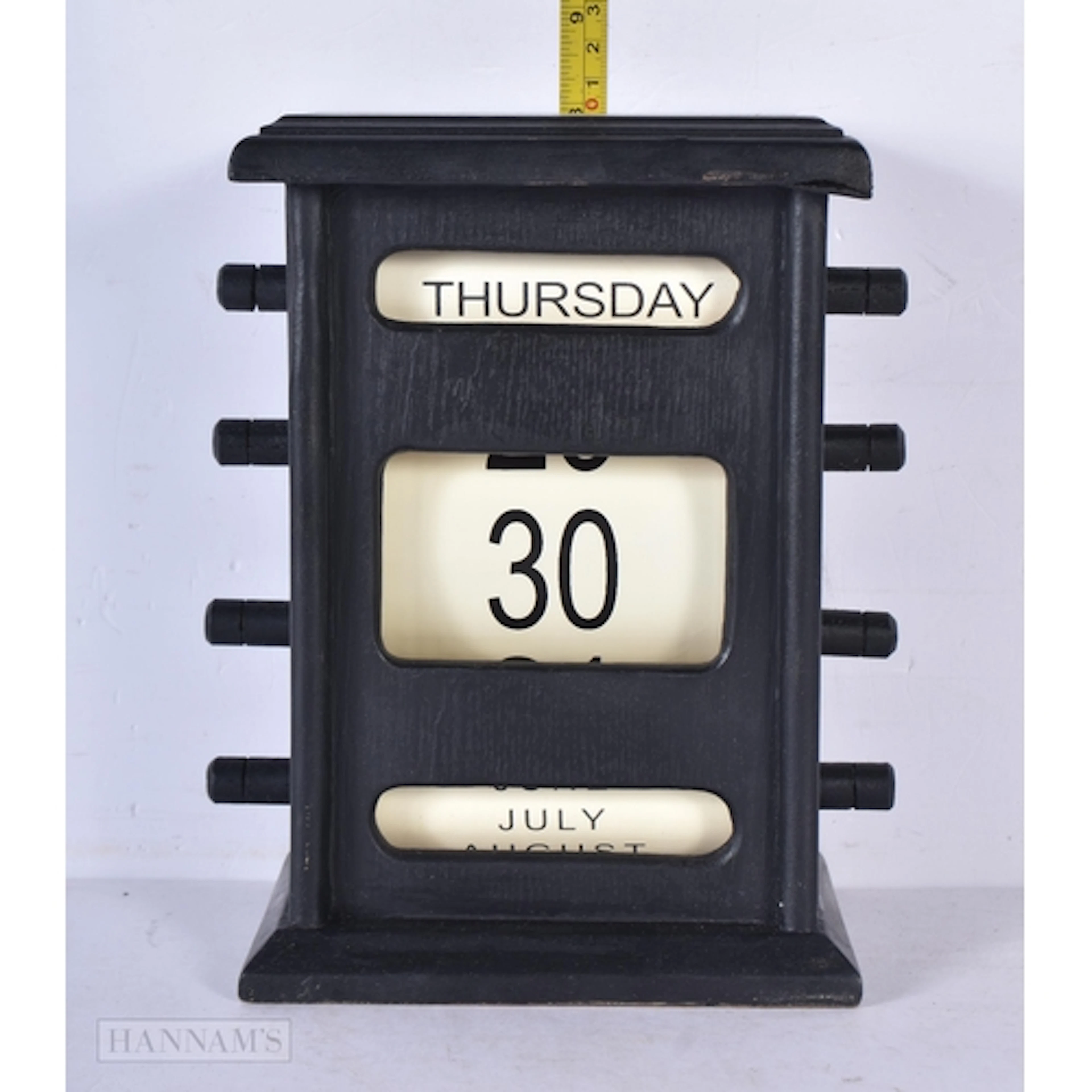 A wooden perpetual calendar 22 x 18cm