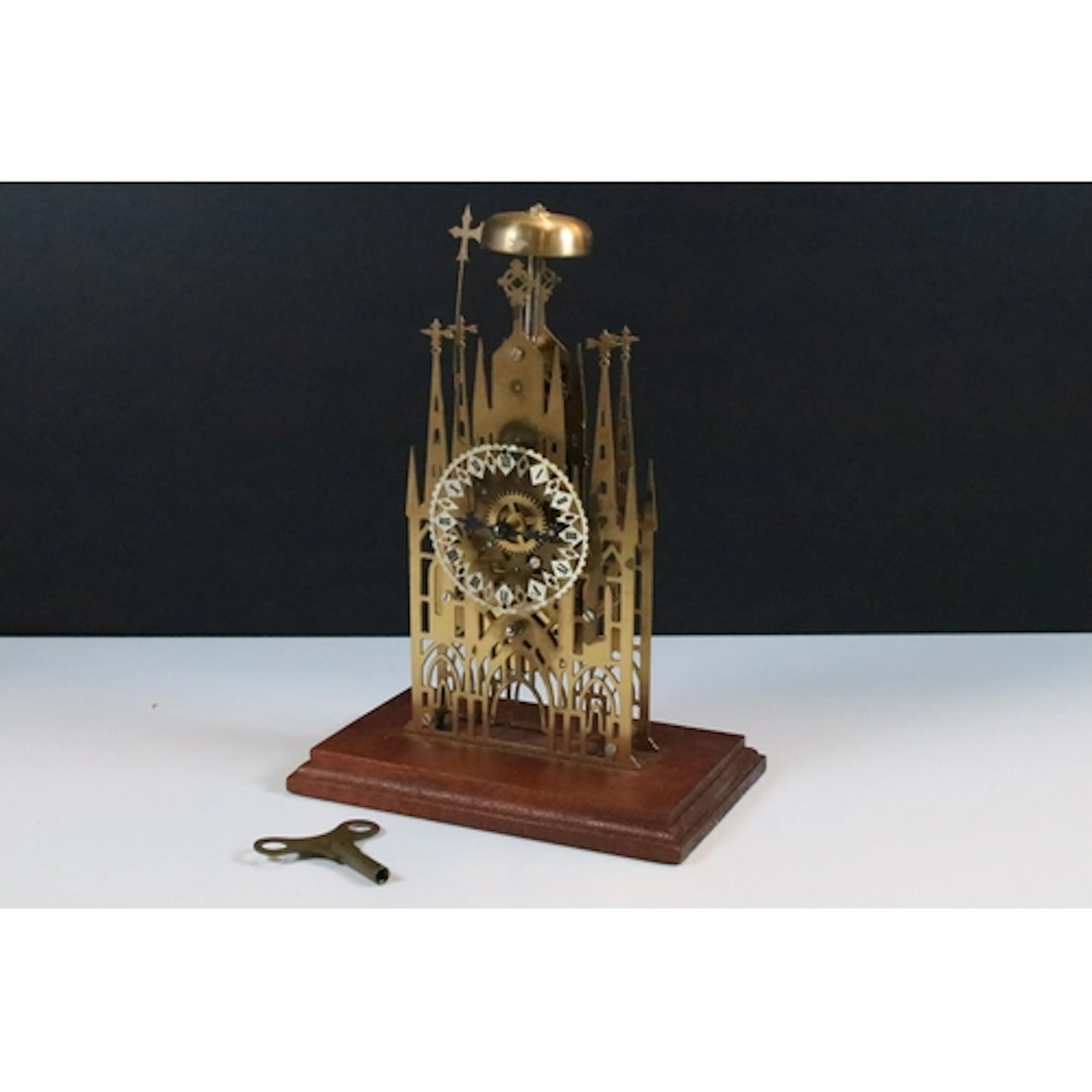 Brass Litchfield Cathedral skeleton clock, with pendulum and...