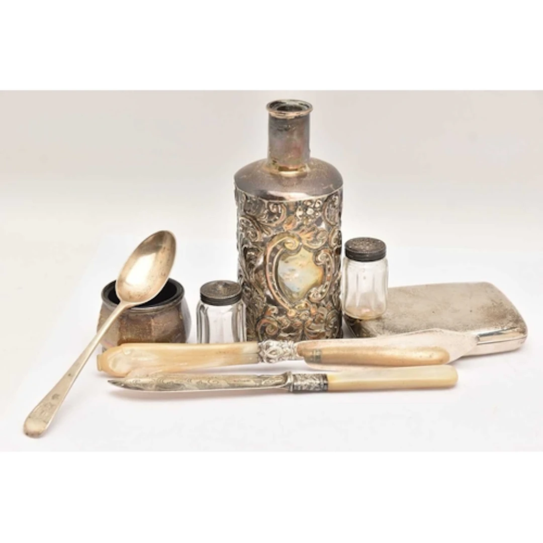AN ASSORTMENT OF SILVER ITEMS, to include a cigarette case o...