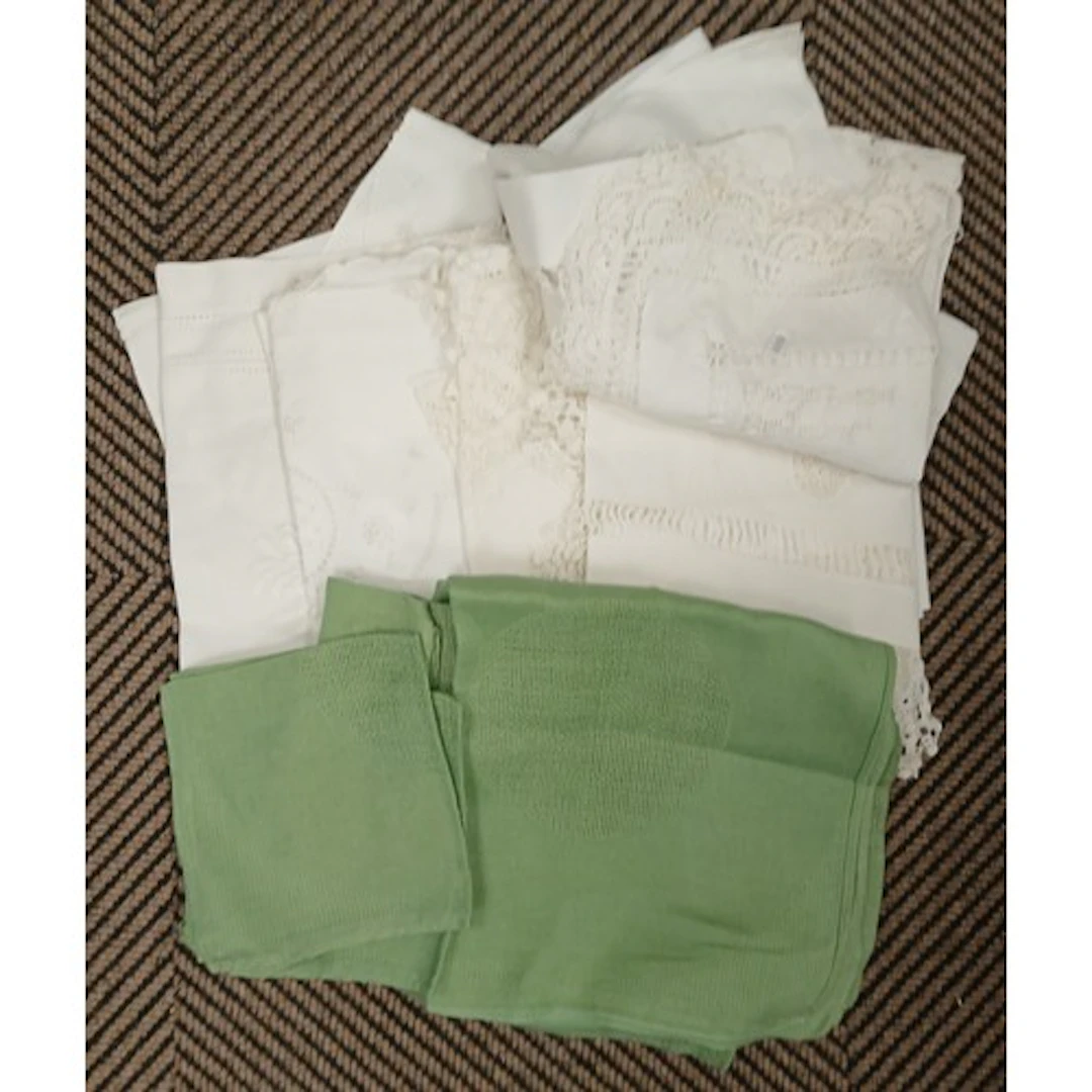 Basket of linens, lace, etc.