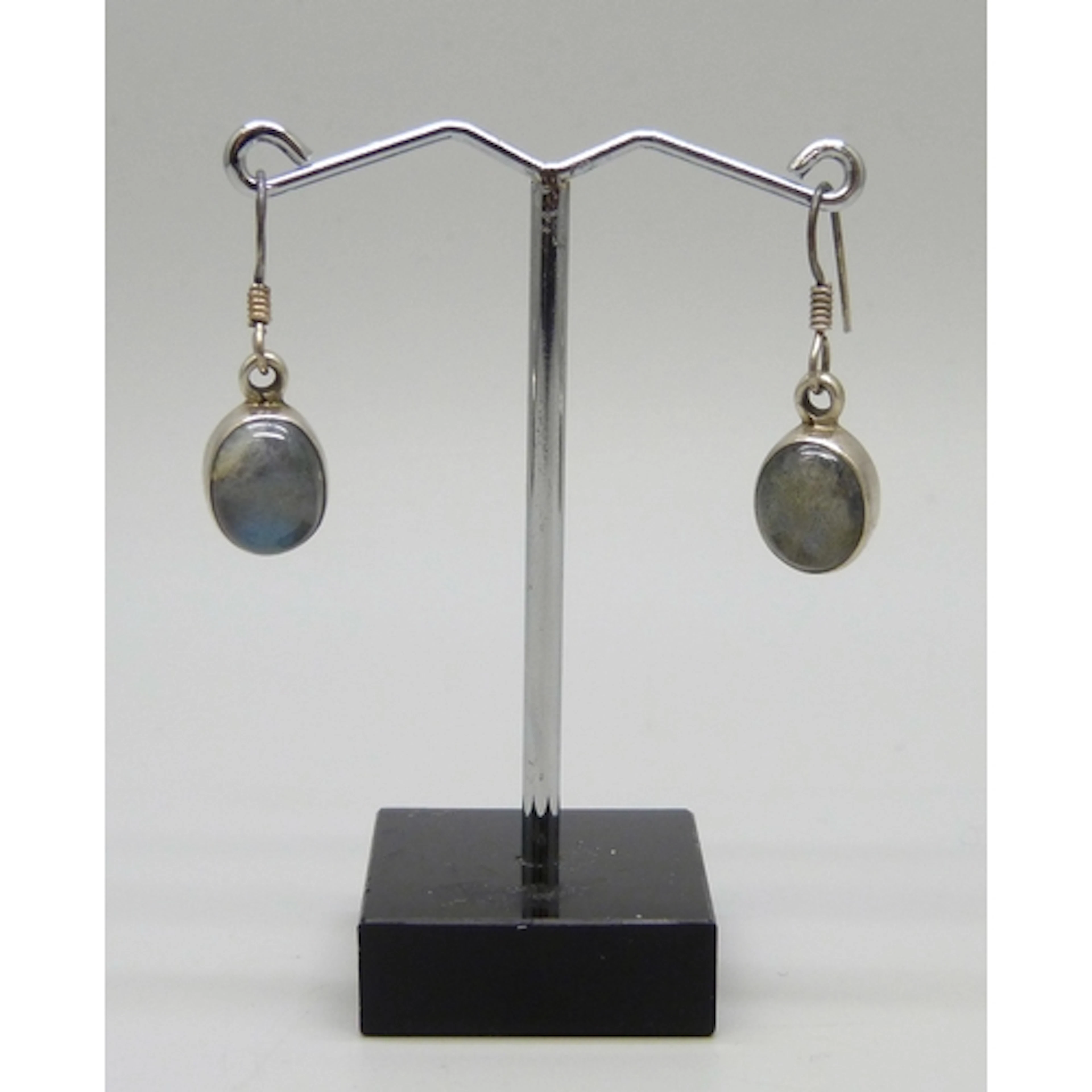 A pair of silver and moonstone earrings, 3cm including hooks