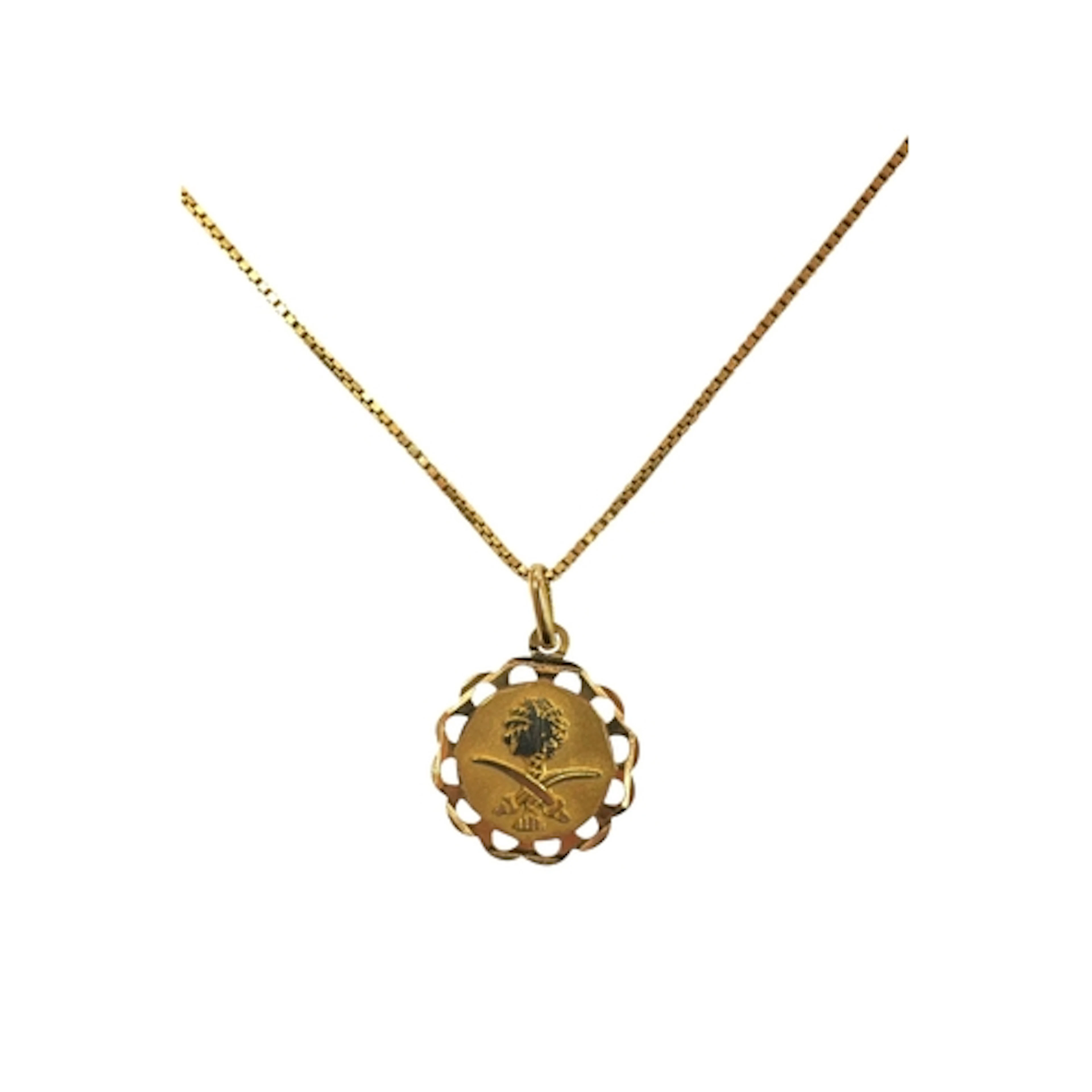 An Italian 750 octagonal pendant decorated with the national...