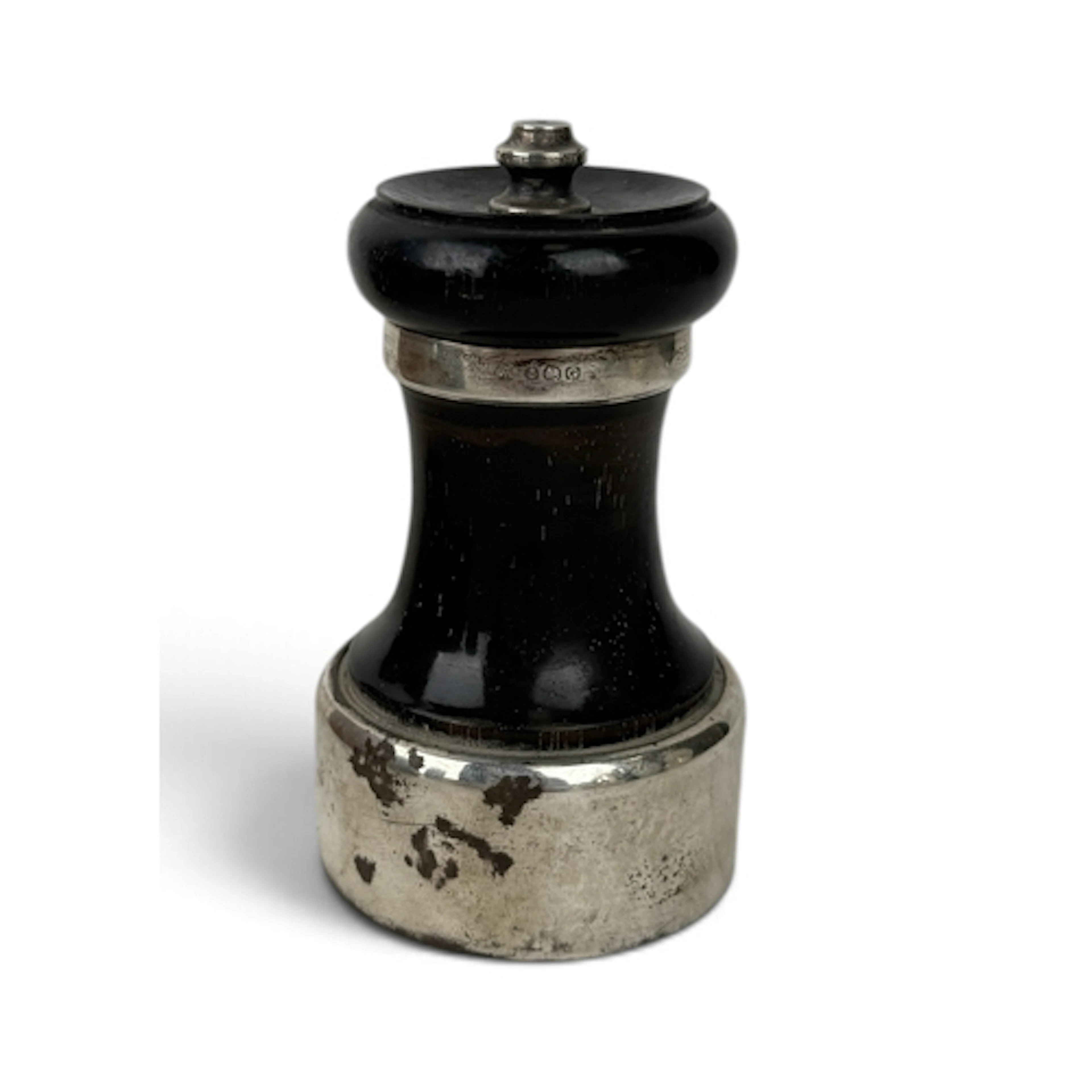A SILVER MOUNTED PEPPER MILL