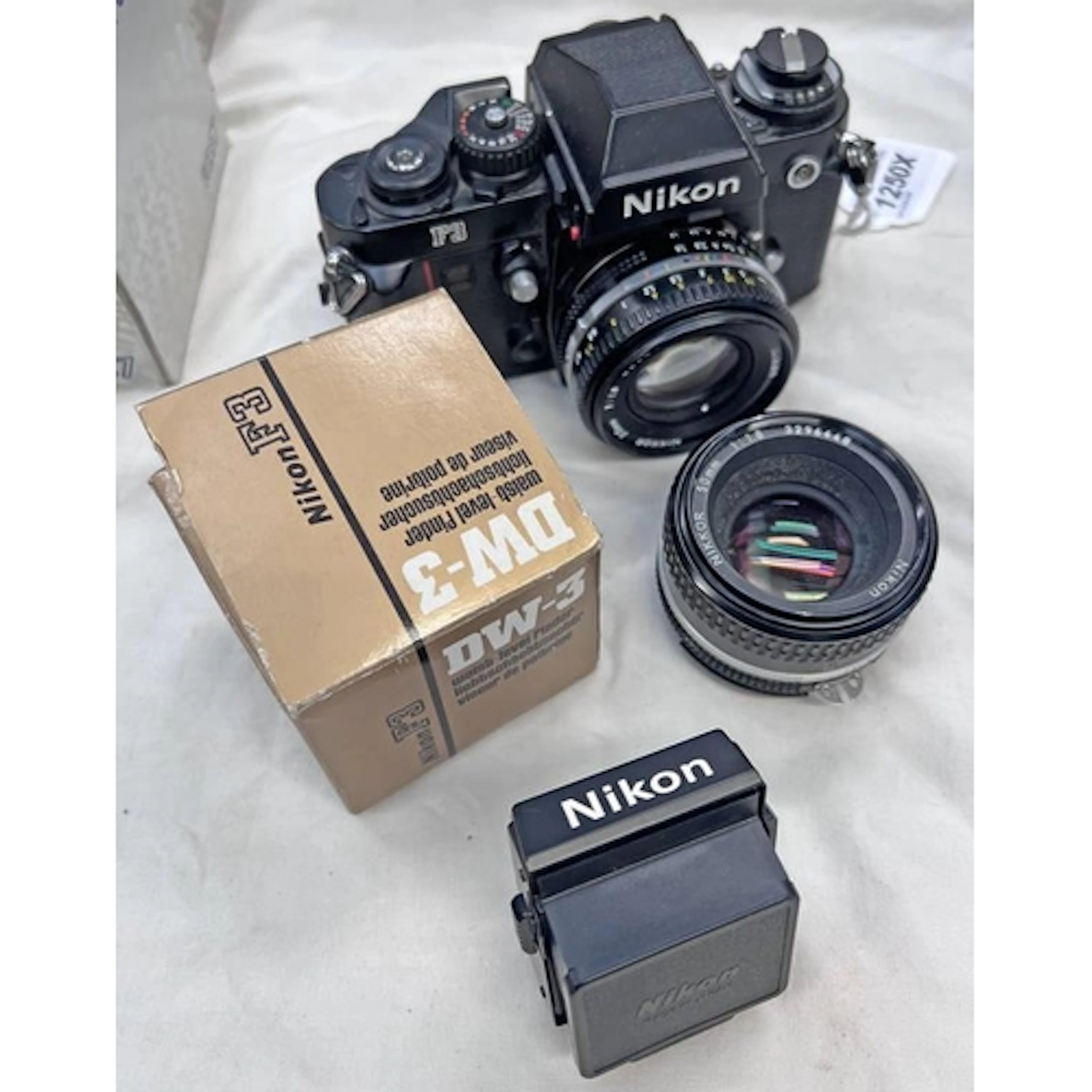 NIKON F3 CAMERA, SERIAL NUMBER 1878840, WITH 2 X NIKON NIKKO...