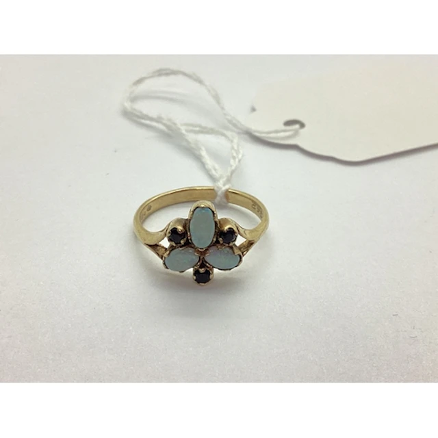 A 9ct Gold Opal Dress Ring, cabochon claw set, with claw set...