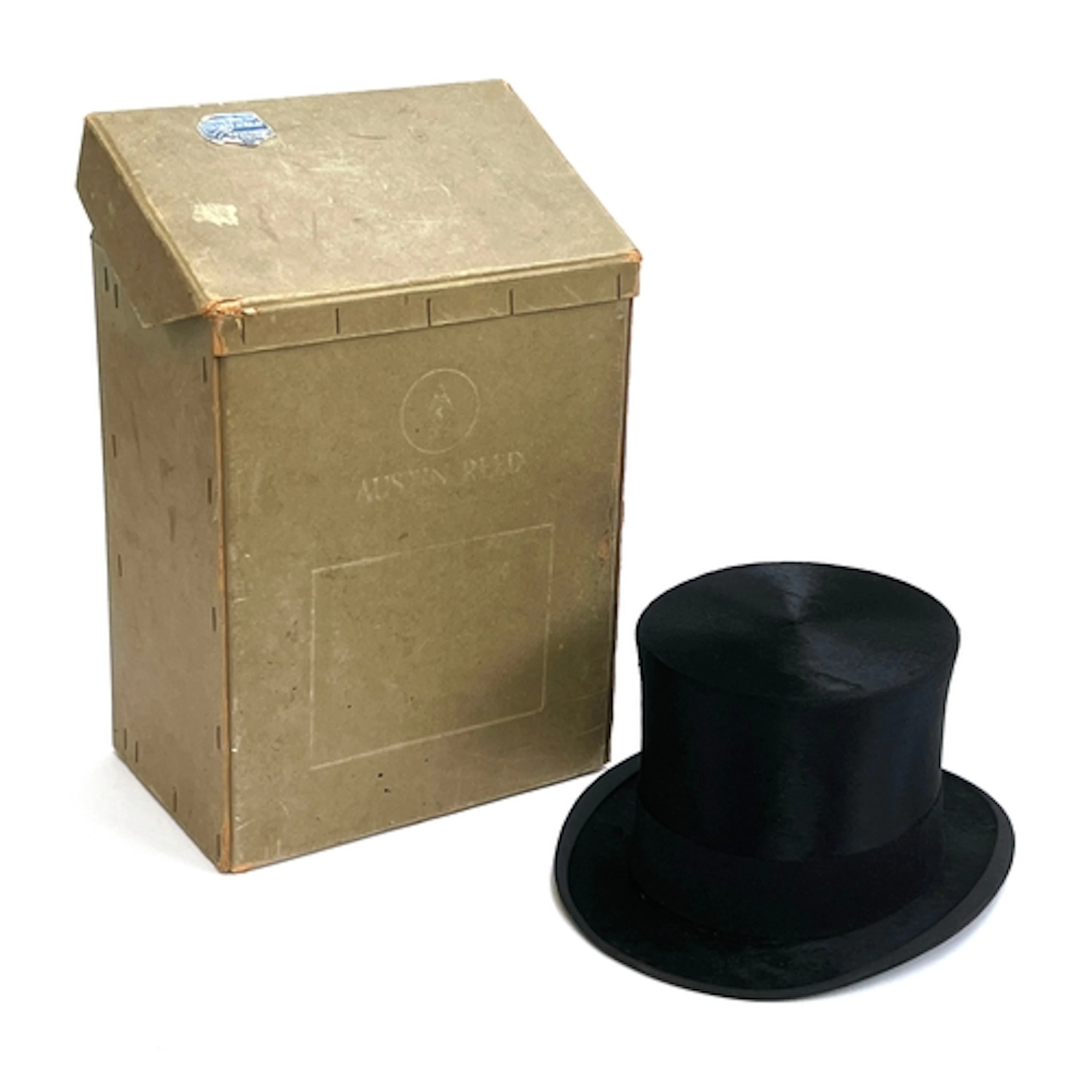 A black silk top hat by Austin Reed, 8" front to back, 6" 3/...