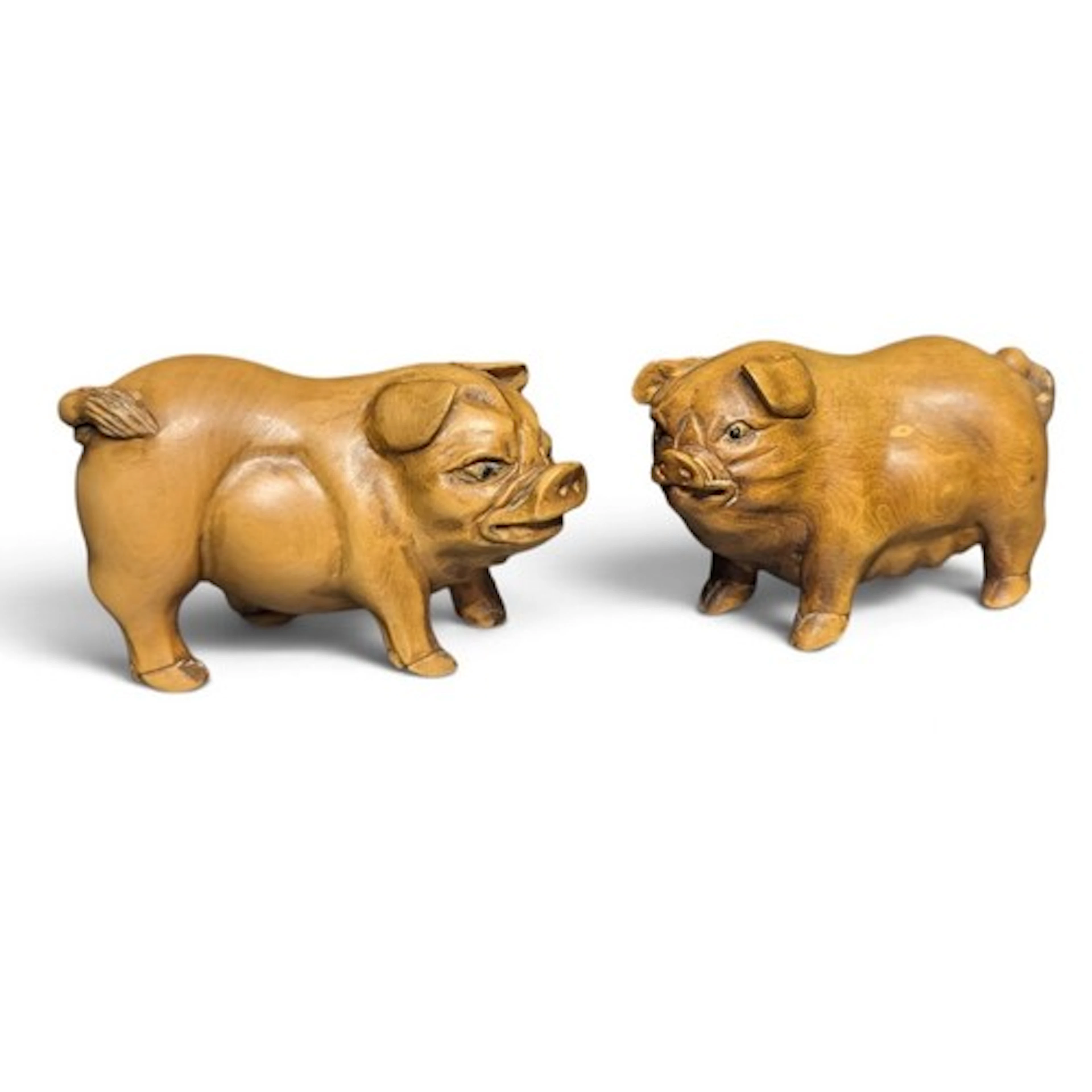 Two boxwood netsuke pigs, length approx. 7cm