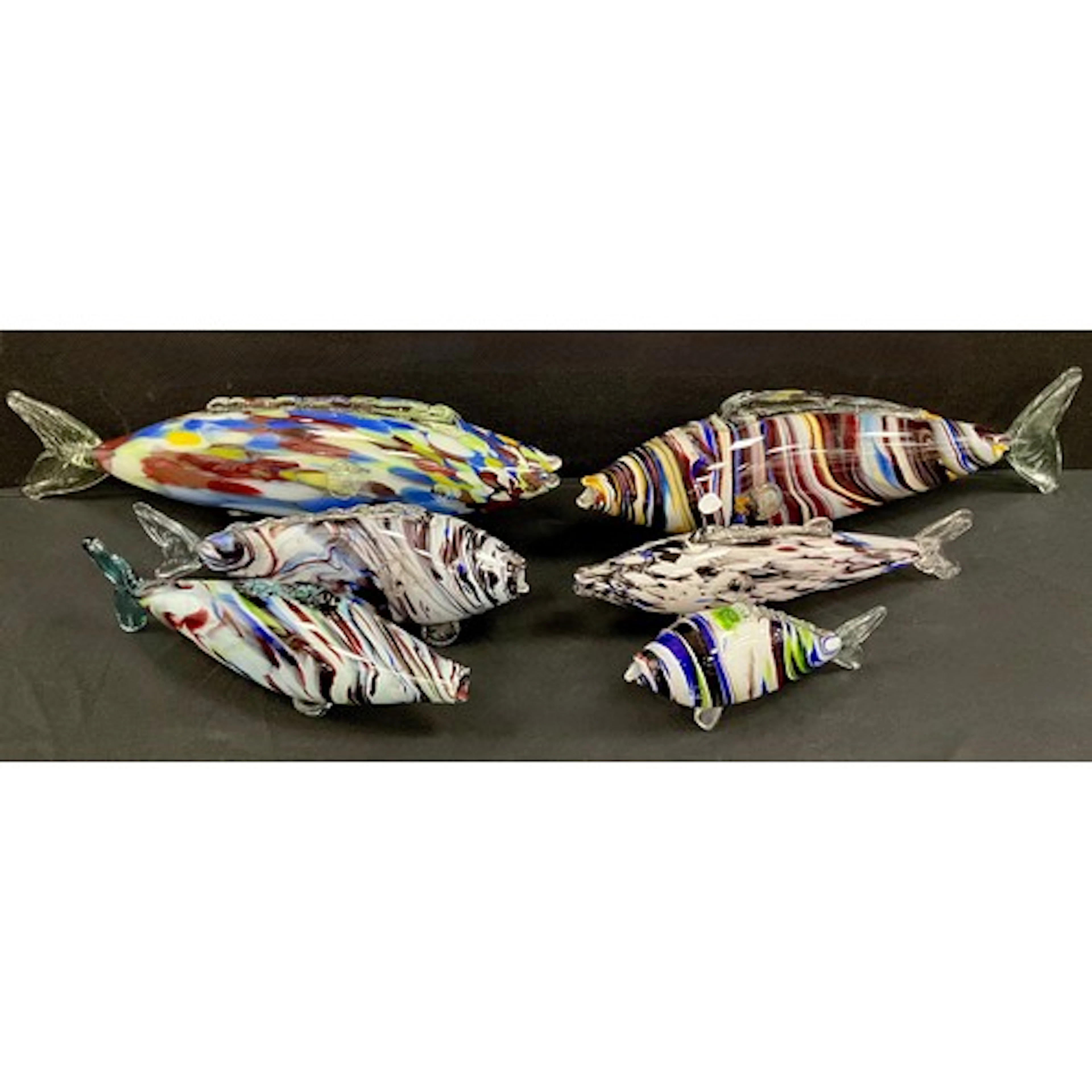 A collection of 1970s and later Murano Glass Fish, with band...