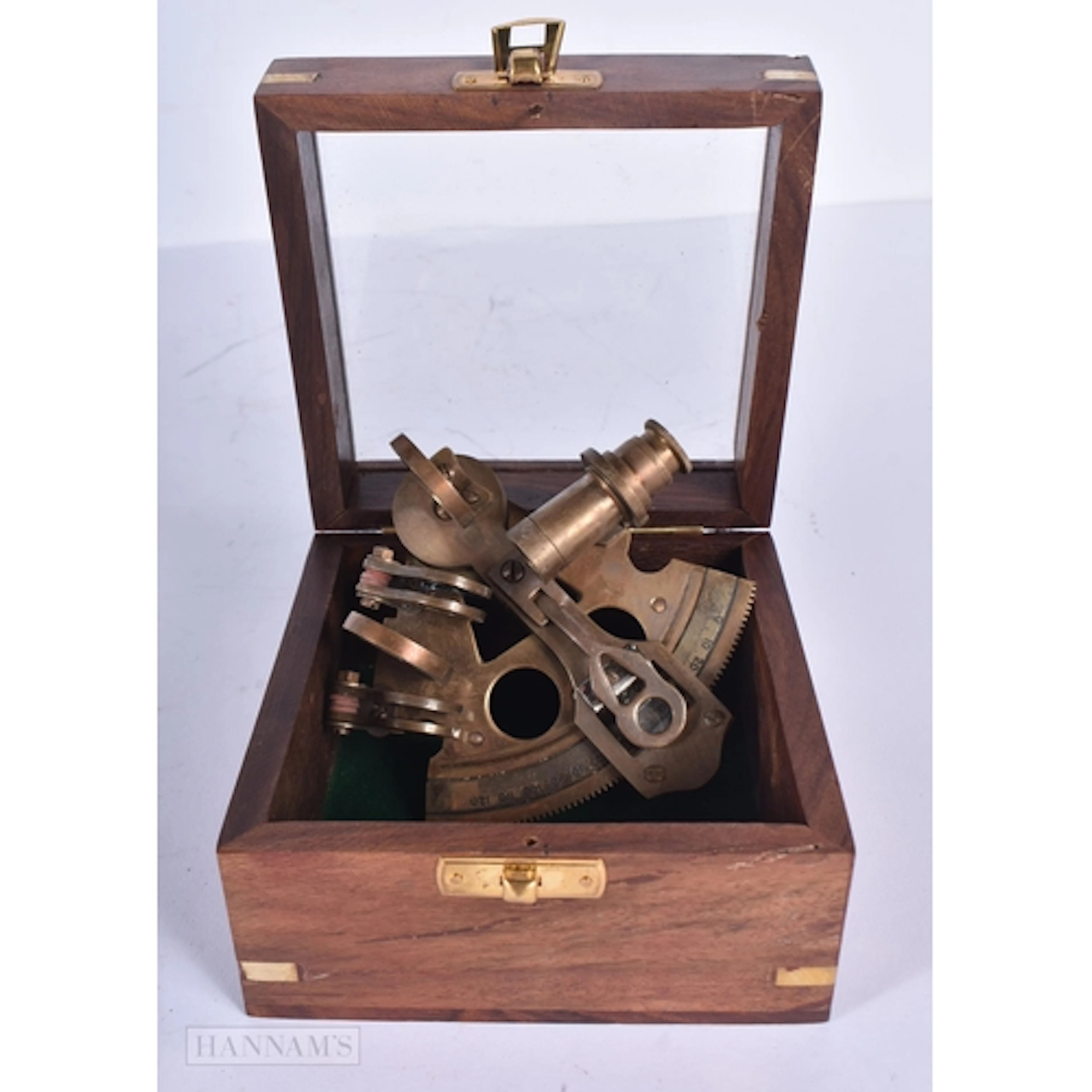 A desktop wooden cased brass sextant 7 x 10.5cm