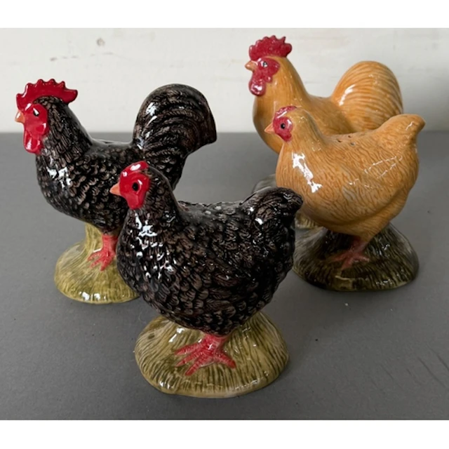 Two sets of two Hen and Cockerel salt and pepper shakers. ...