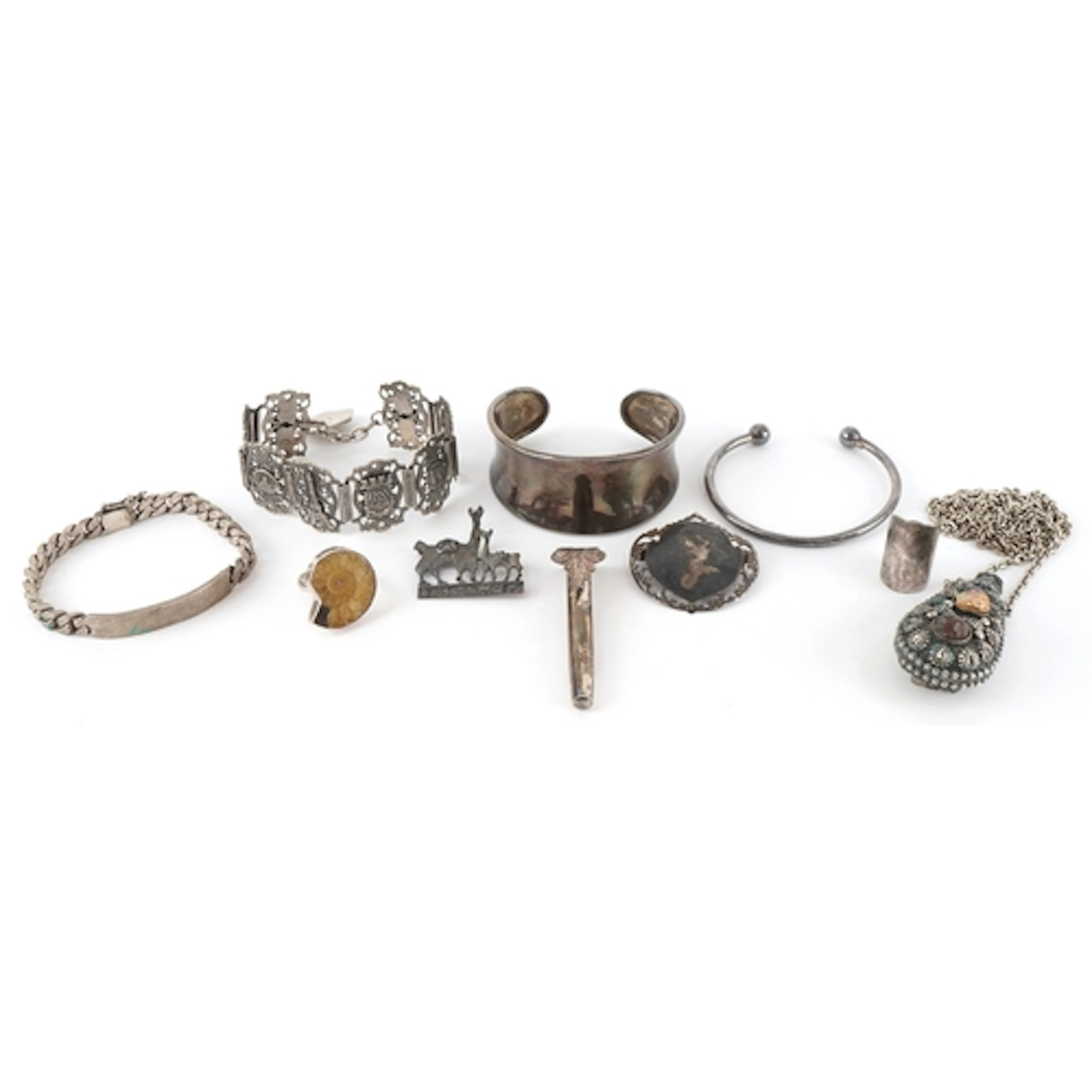 Silver and white metal jewellery including an ammonite ring,...