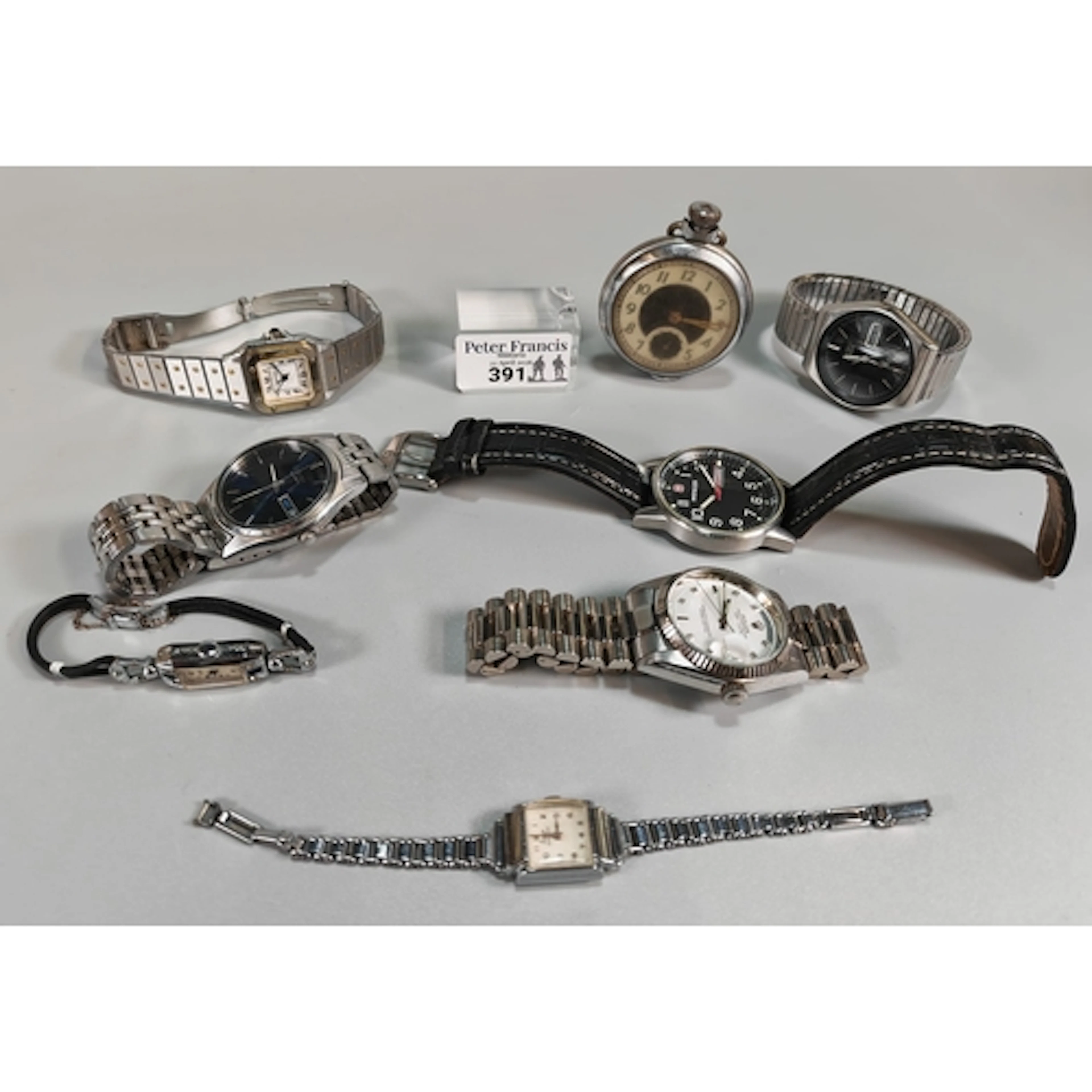 Plastic tub of watches to include: Wenger, Seiko Quartz, coc...