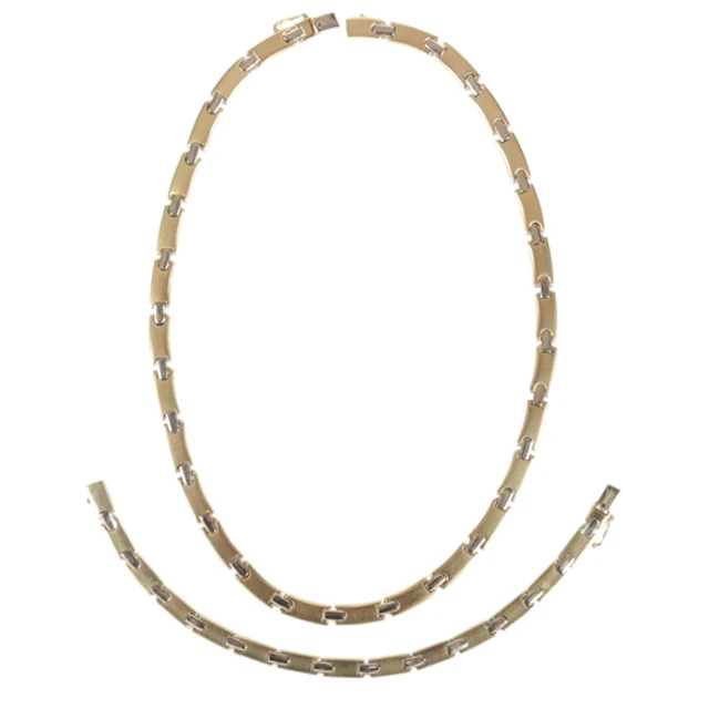 A gold demi-parure, comprising: a necklace and bracelet, eac...