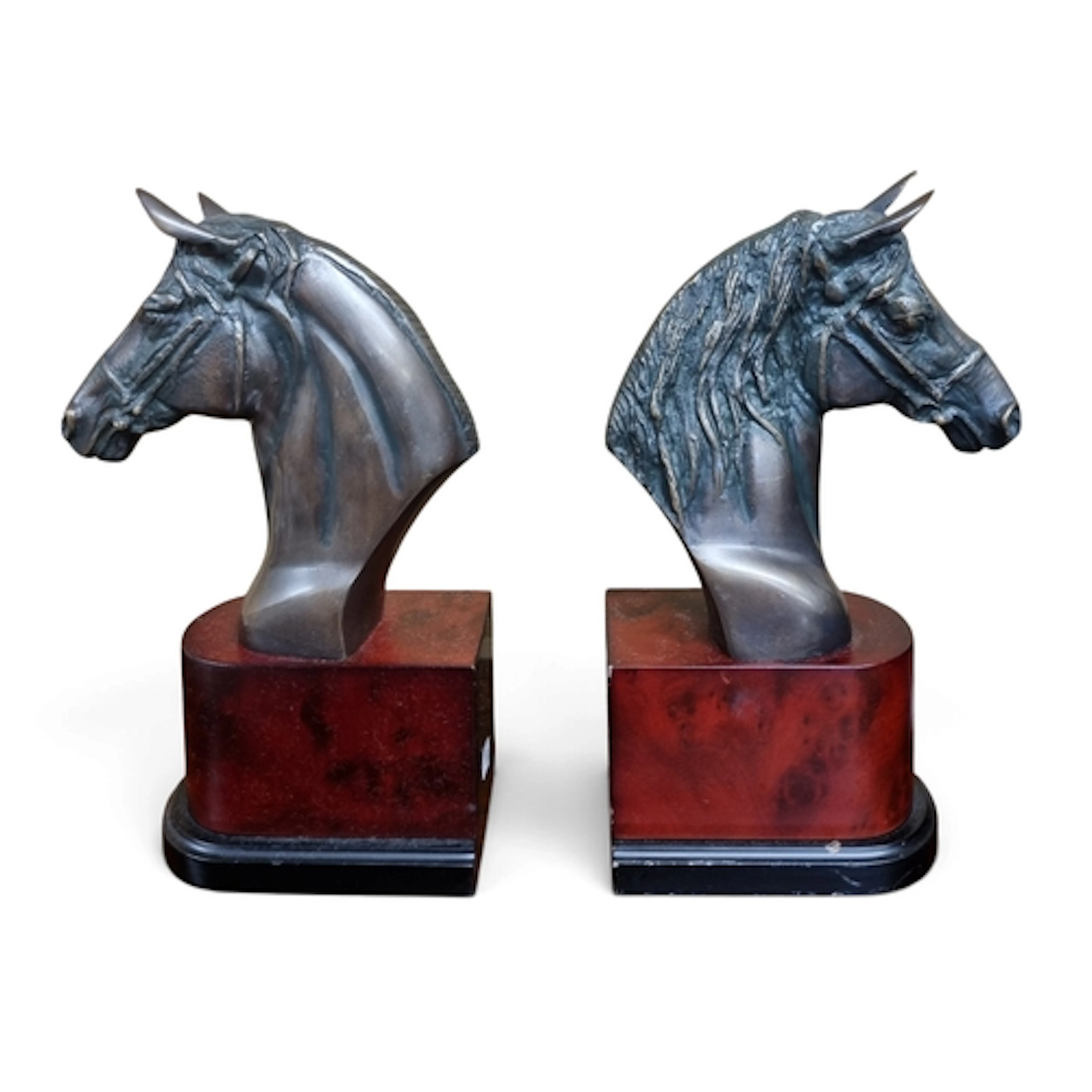 A good pair of Bookends in the form of Horses Heads along wi...