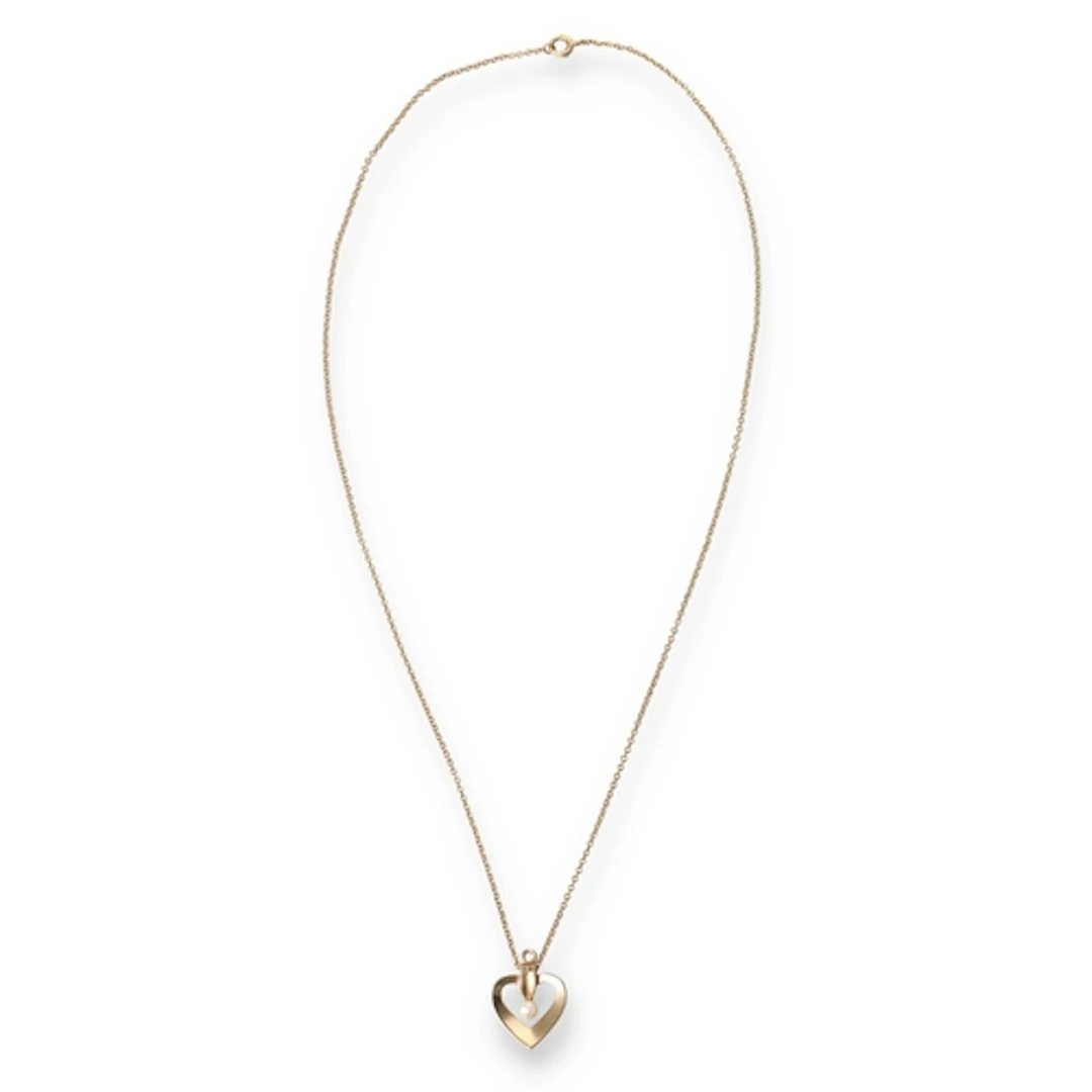 A 9CT GOLD PENDANT ON CHAIN Weight: 4gms