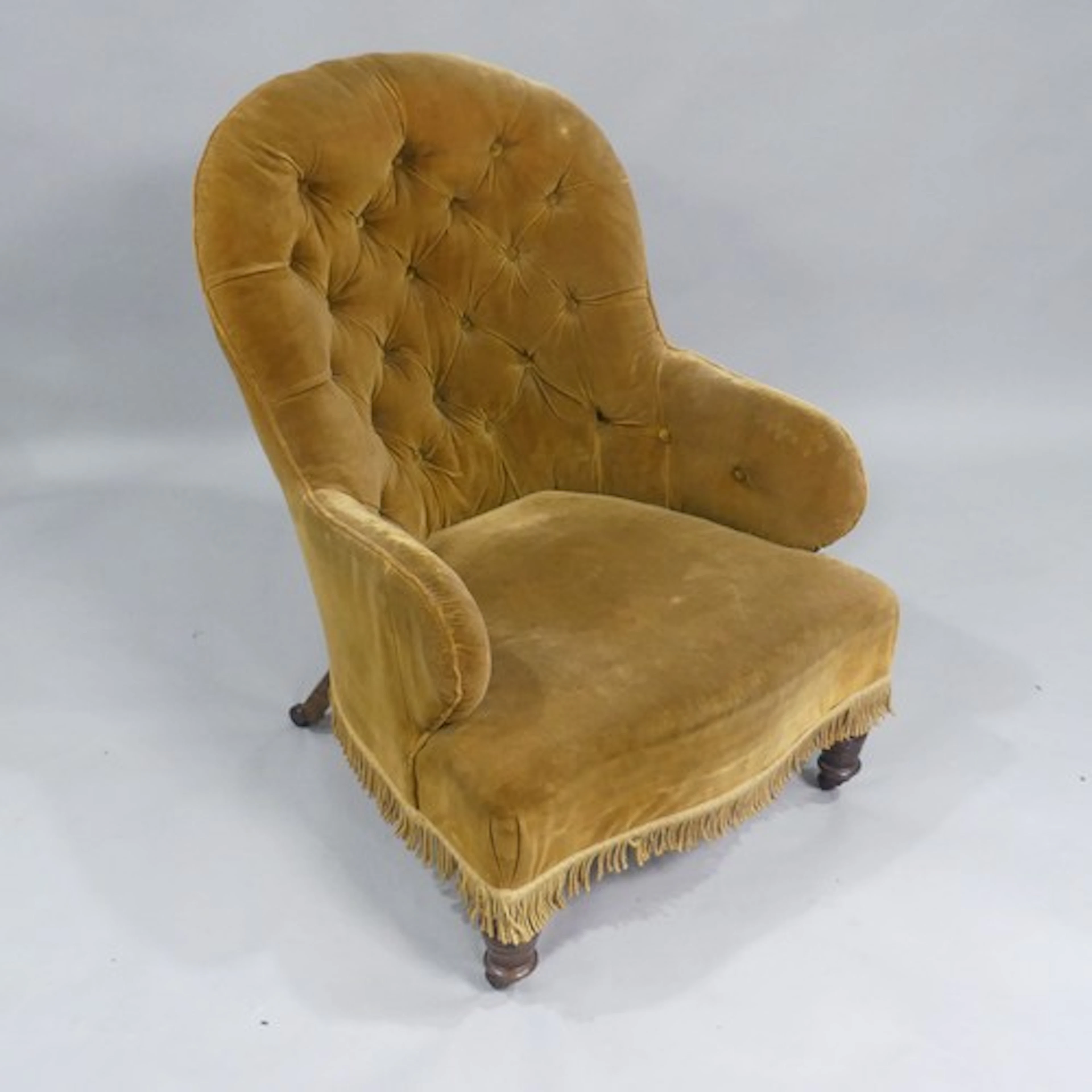 A Victorian ladies upholstered Armchair, applied with a velv...